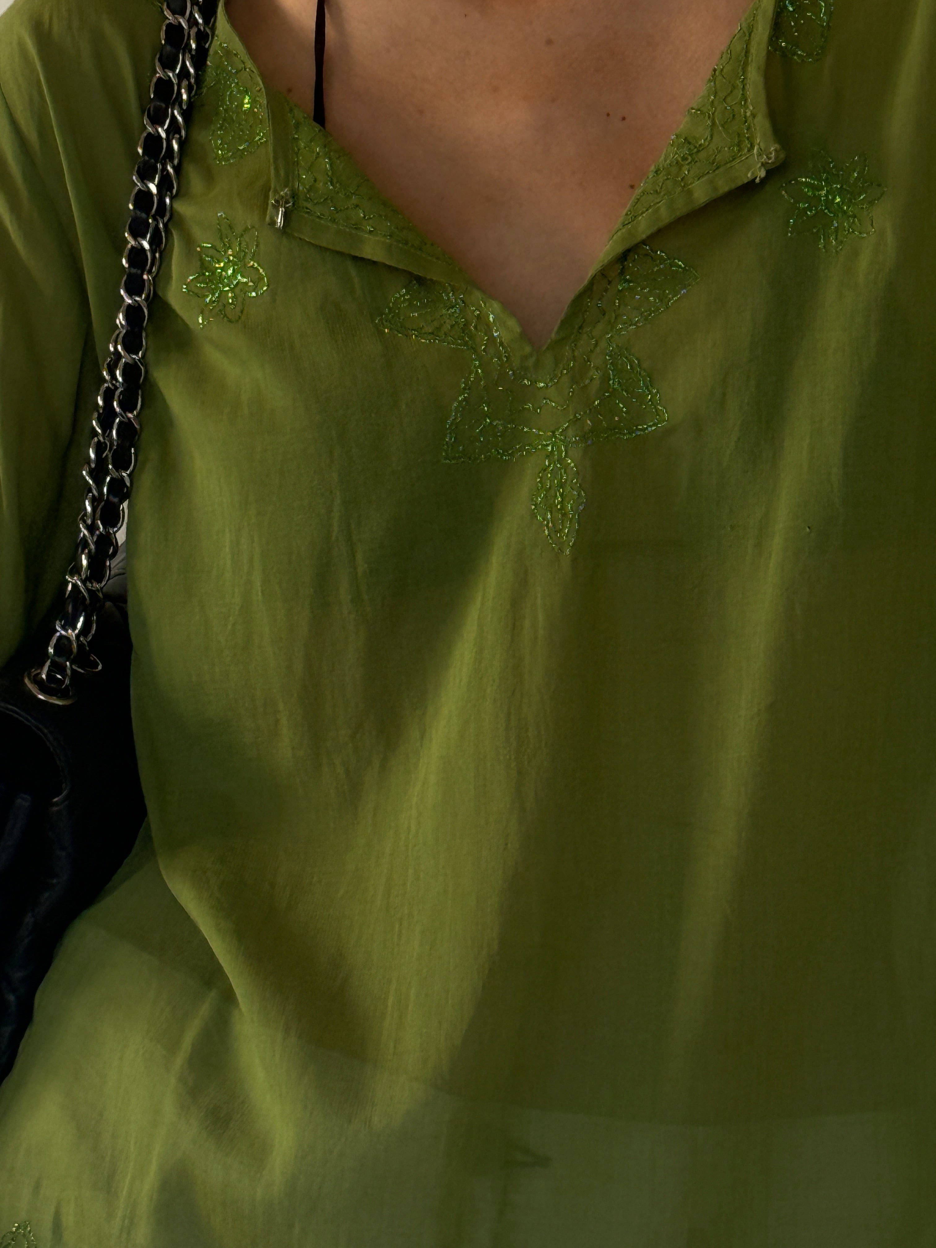 Vintage olive green viscose fabric close-up