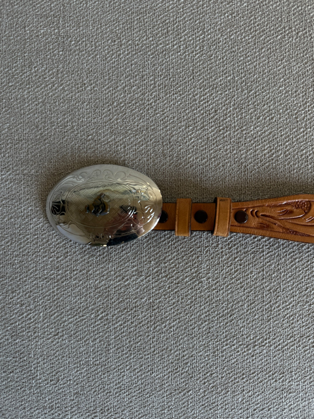 Vintage Western tooled leather belt buckle detail tan