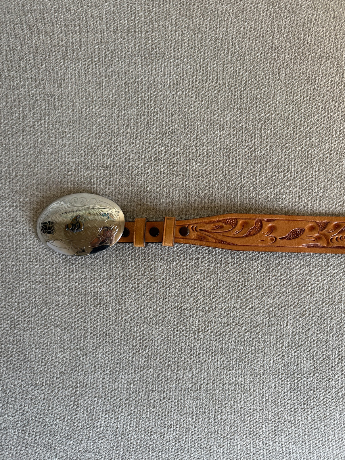 Vintage Western tooled leather belt full view tan