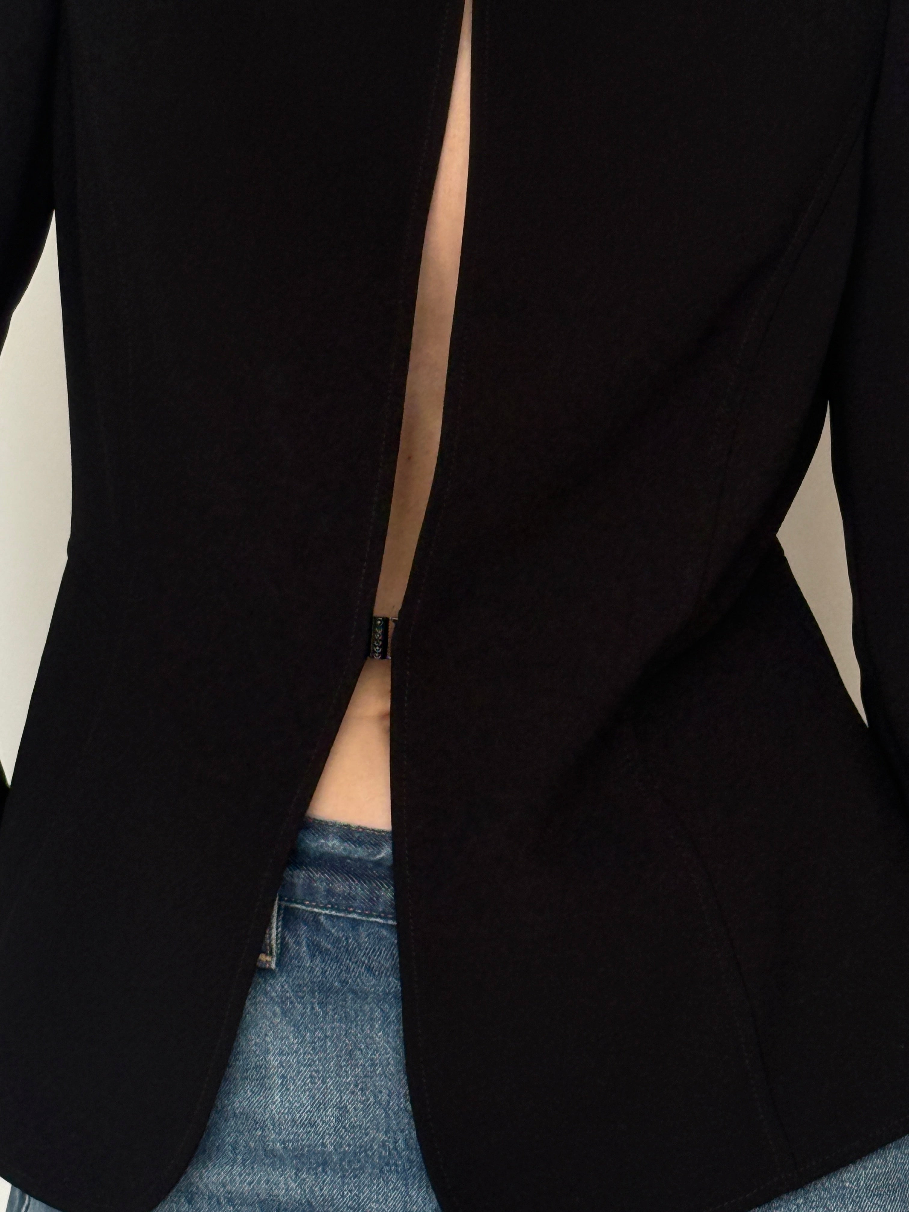 Vintage black blazer fabric close-up