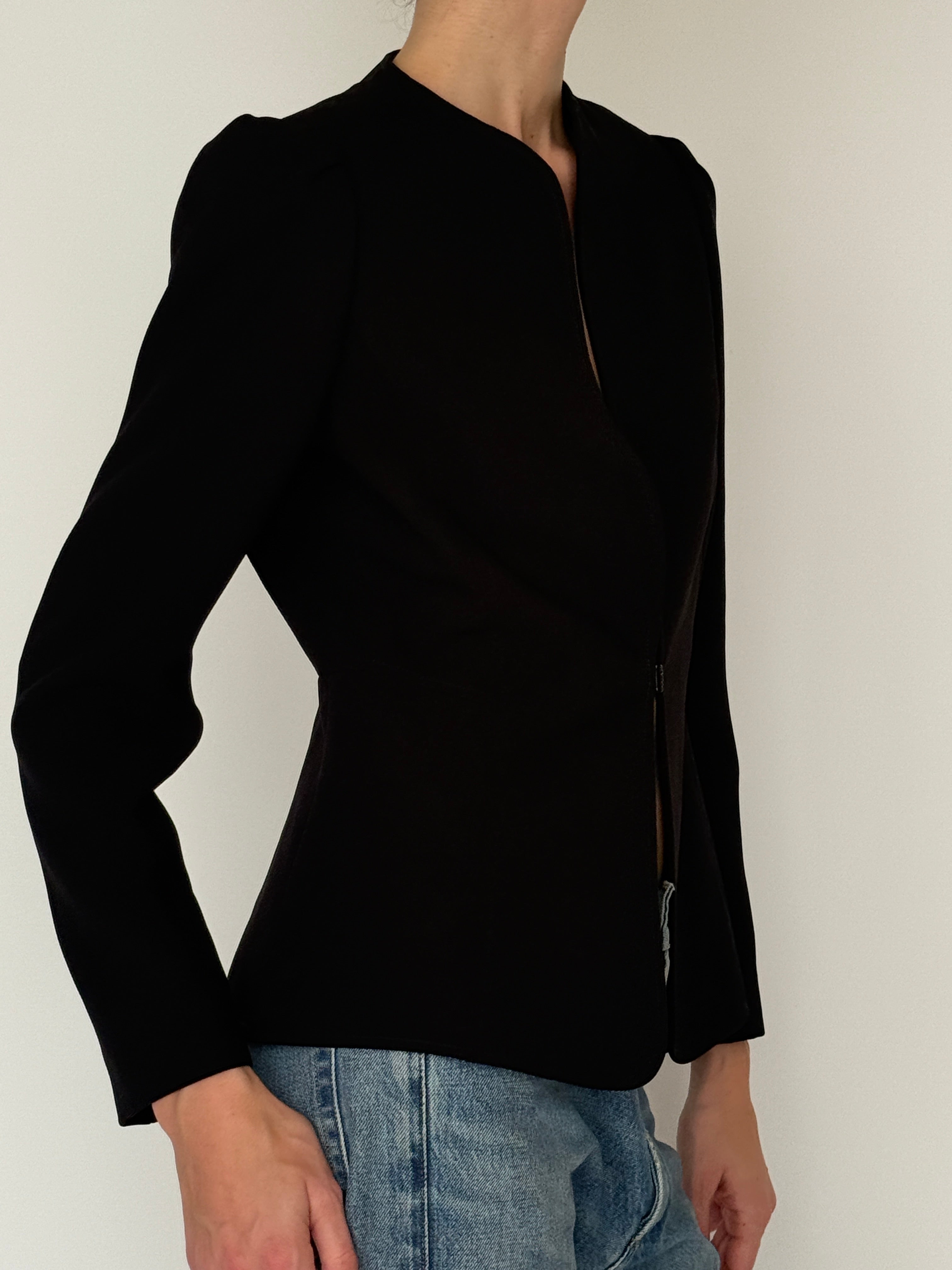 Vintage black blazer side view with sculpted shoulders