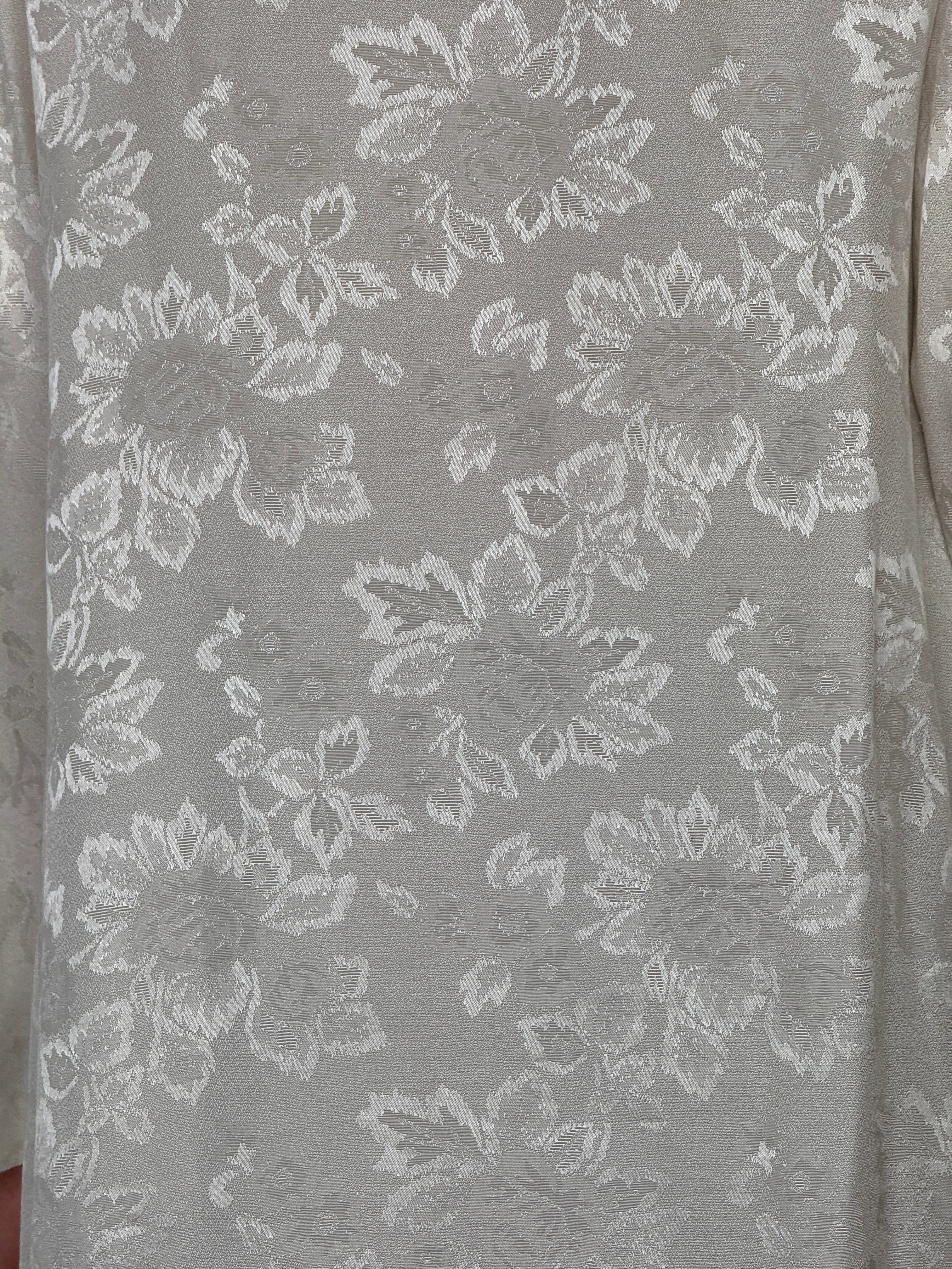 Vintage ivory jacquard frog closure jacket fabric close-up