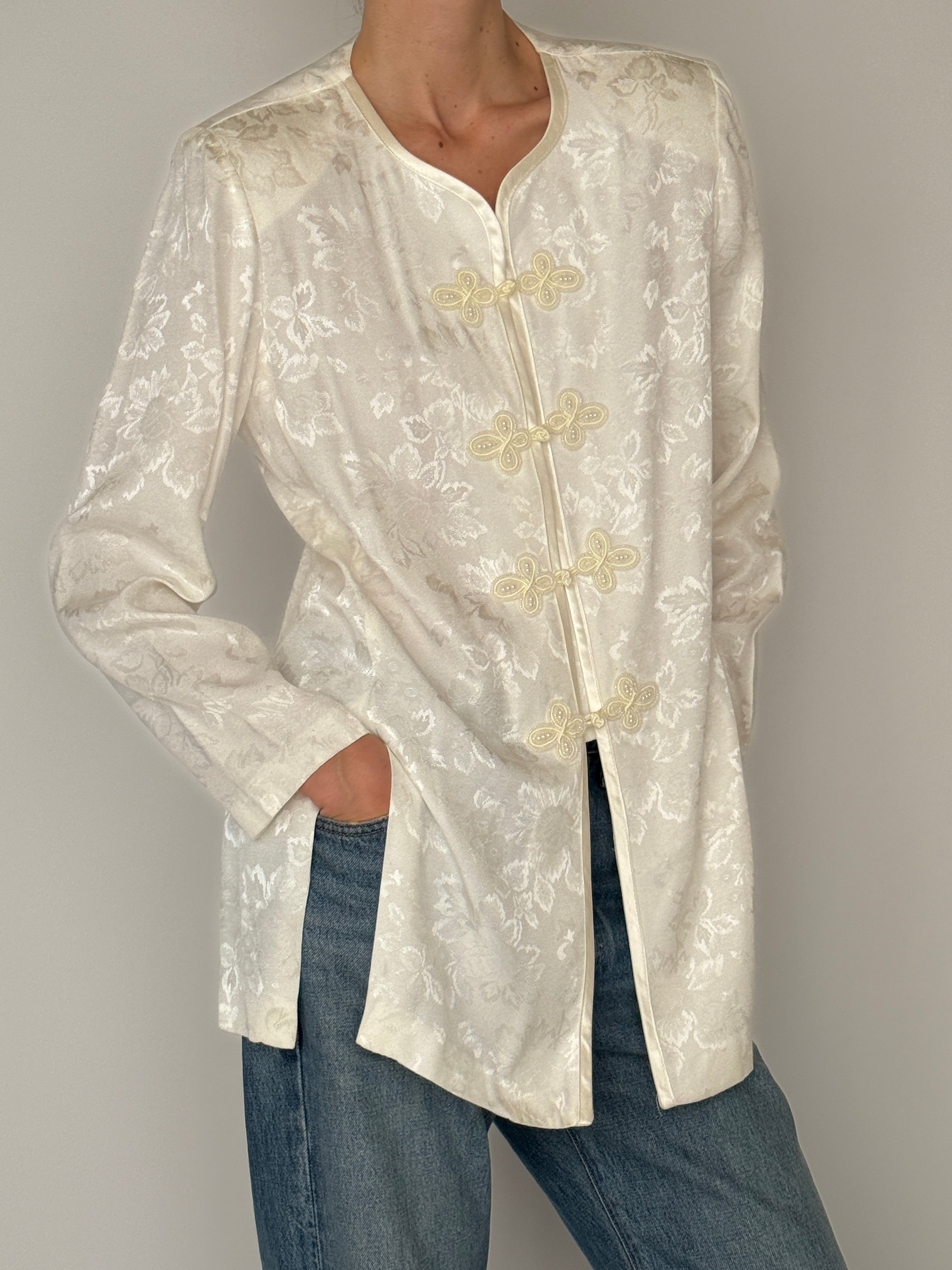 Vintage ivory jacquard frog closure jacket side view