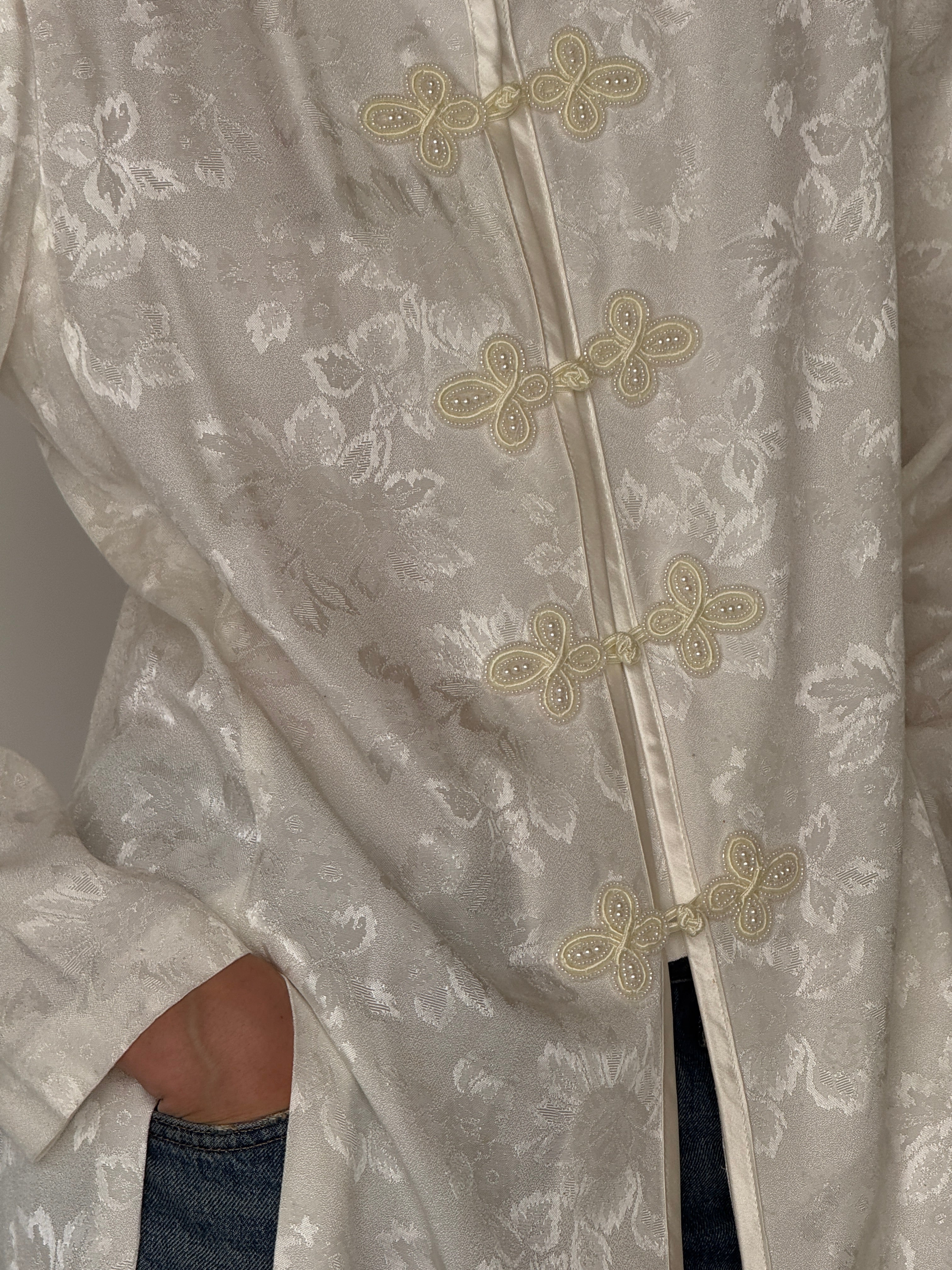Vintage ivory jacquard frog closure jacket front view