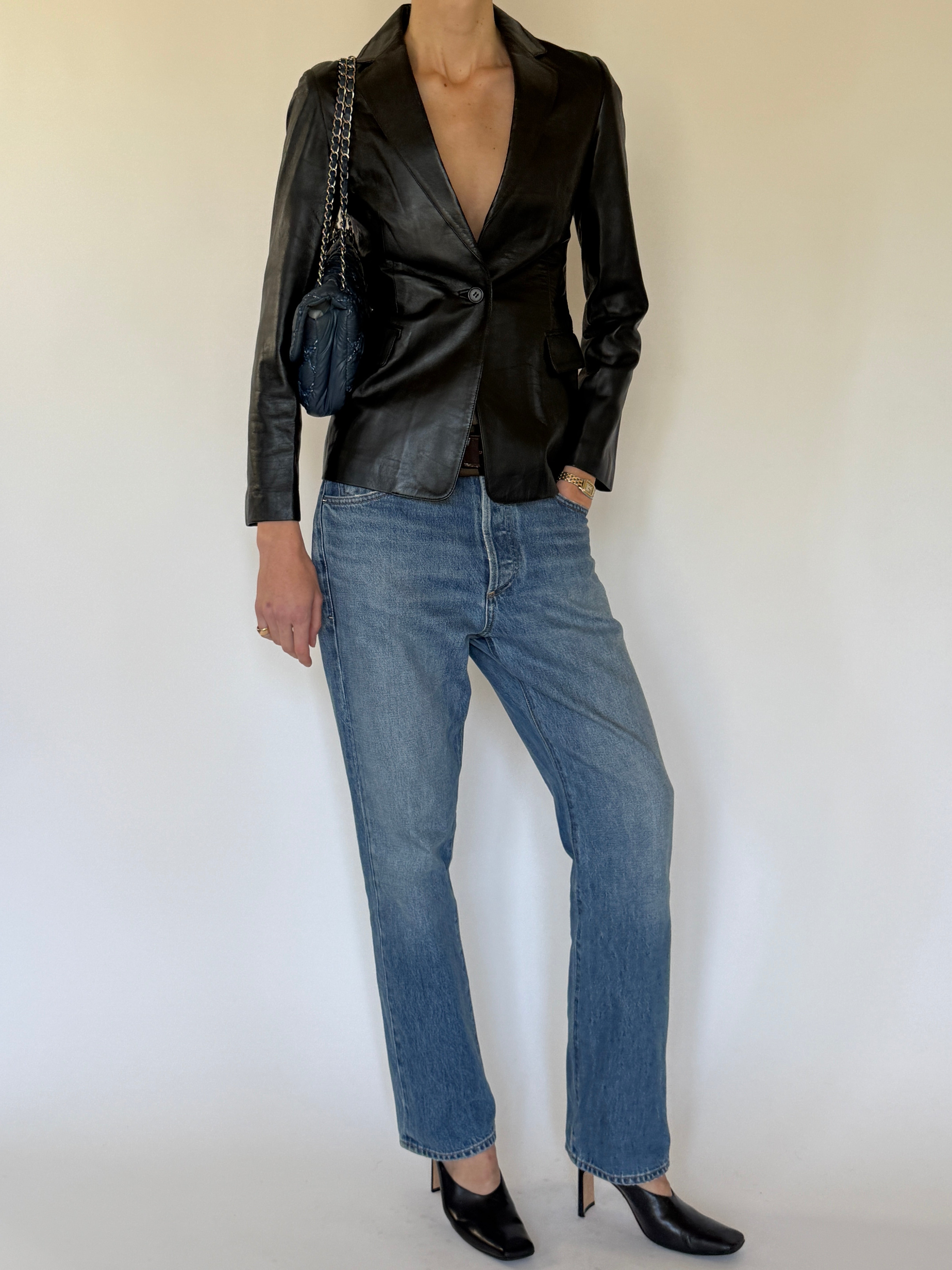 Vintage black leather blazer side view tailored silhouette