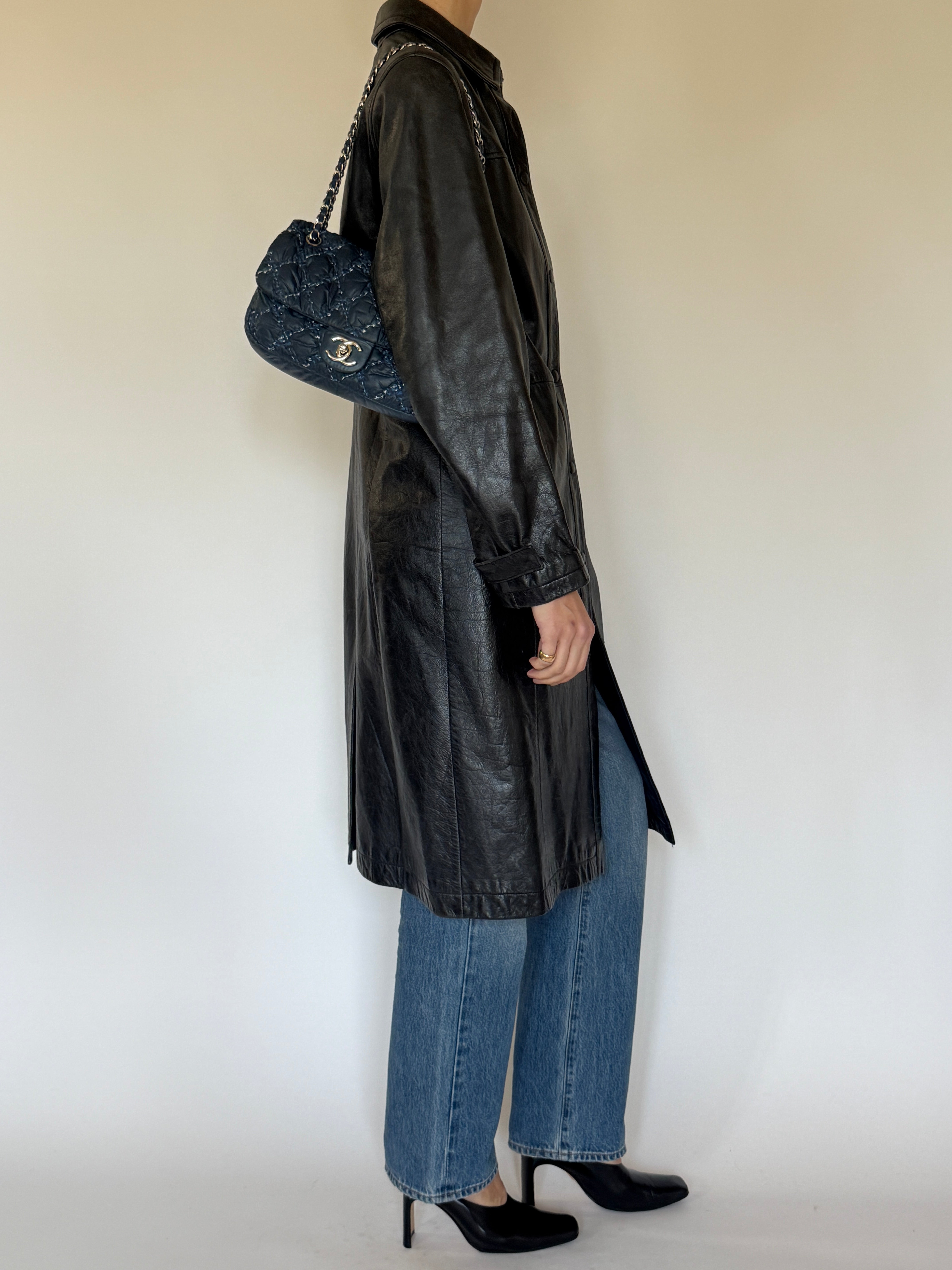 Vintage leather coat side view