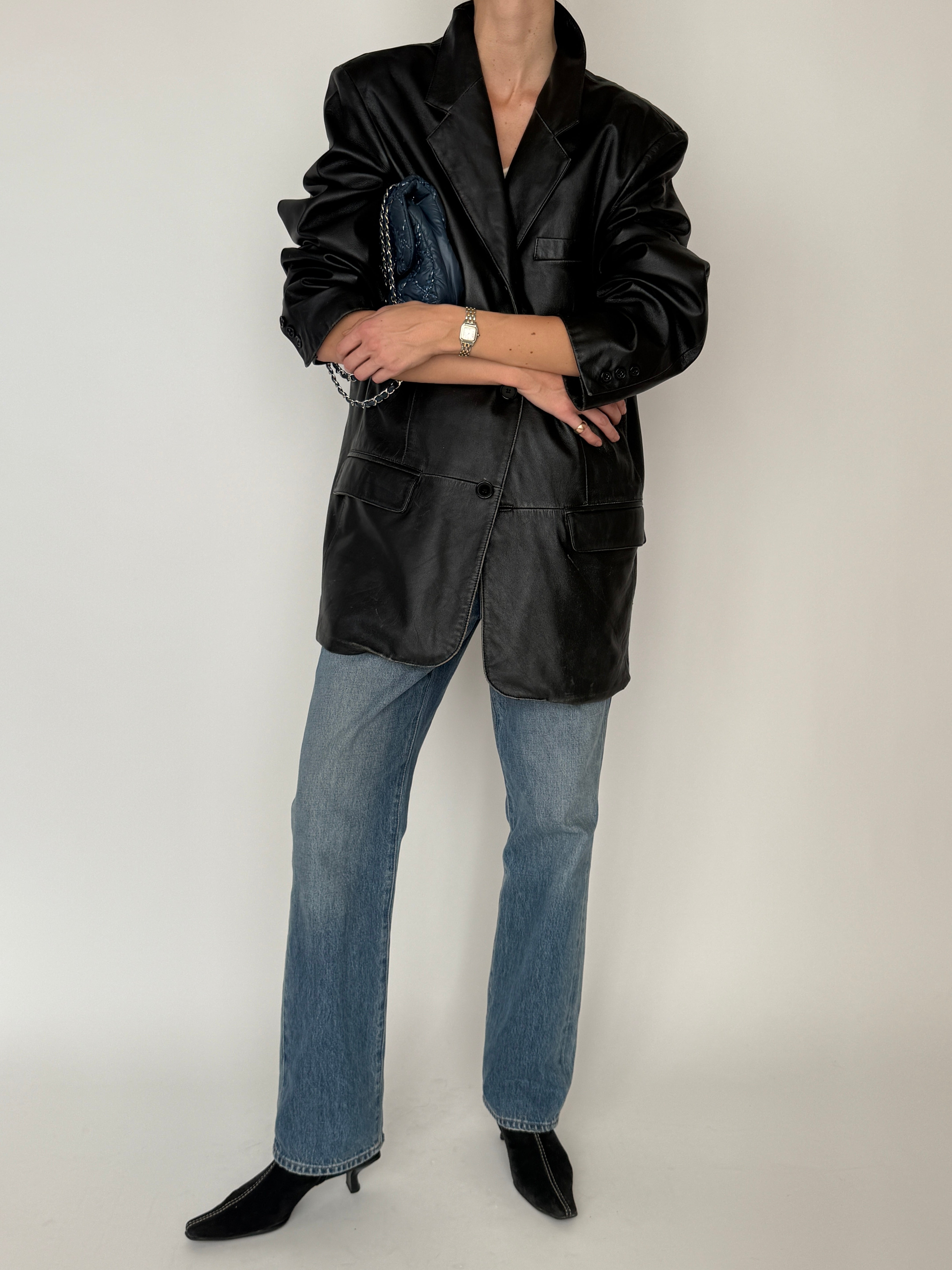 Vintage black leather blazer lapel detail