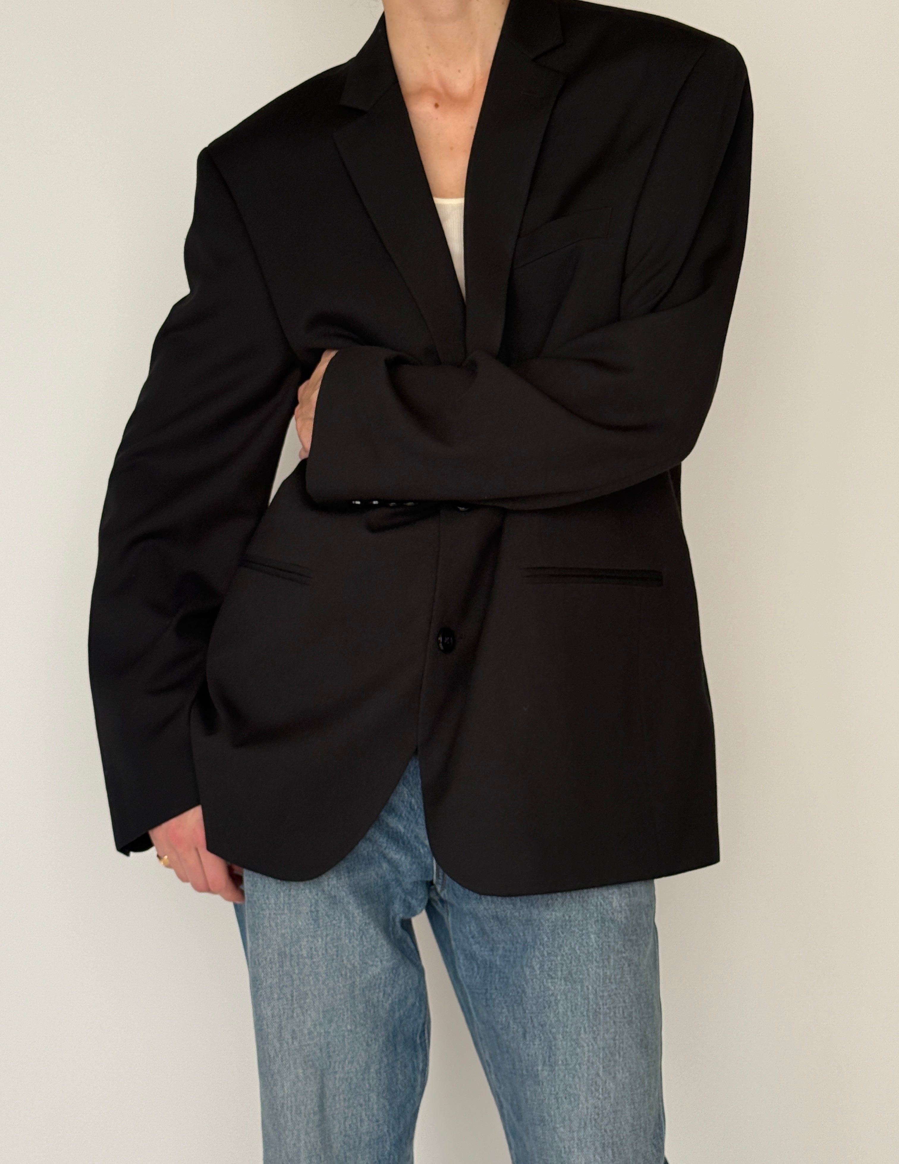 Vintage black single-breasted blazer front pocket detail