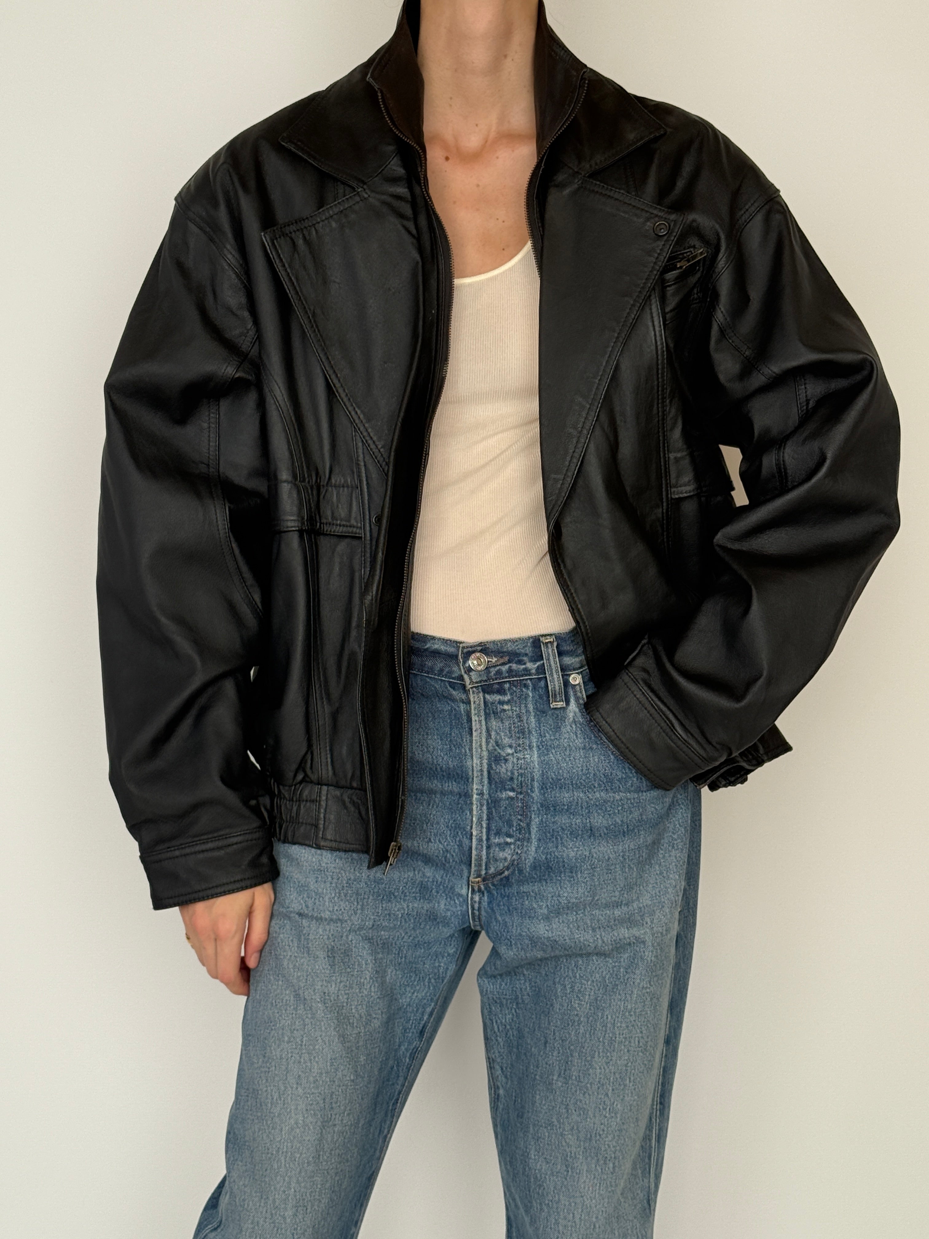 Vintage leather jacket black structured silhouette