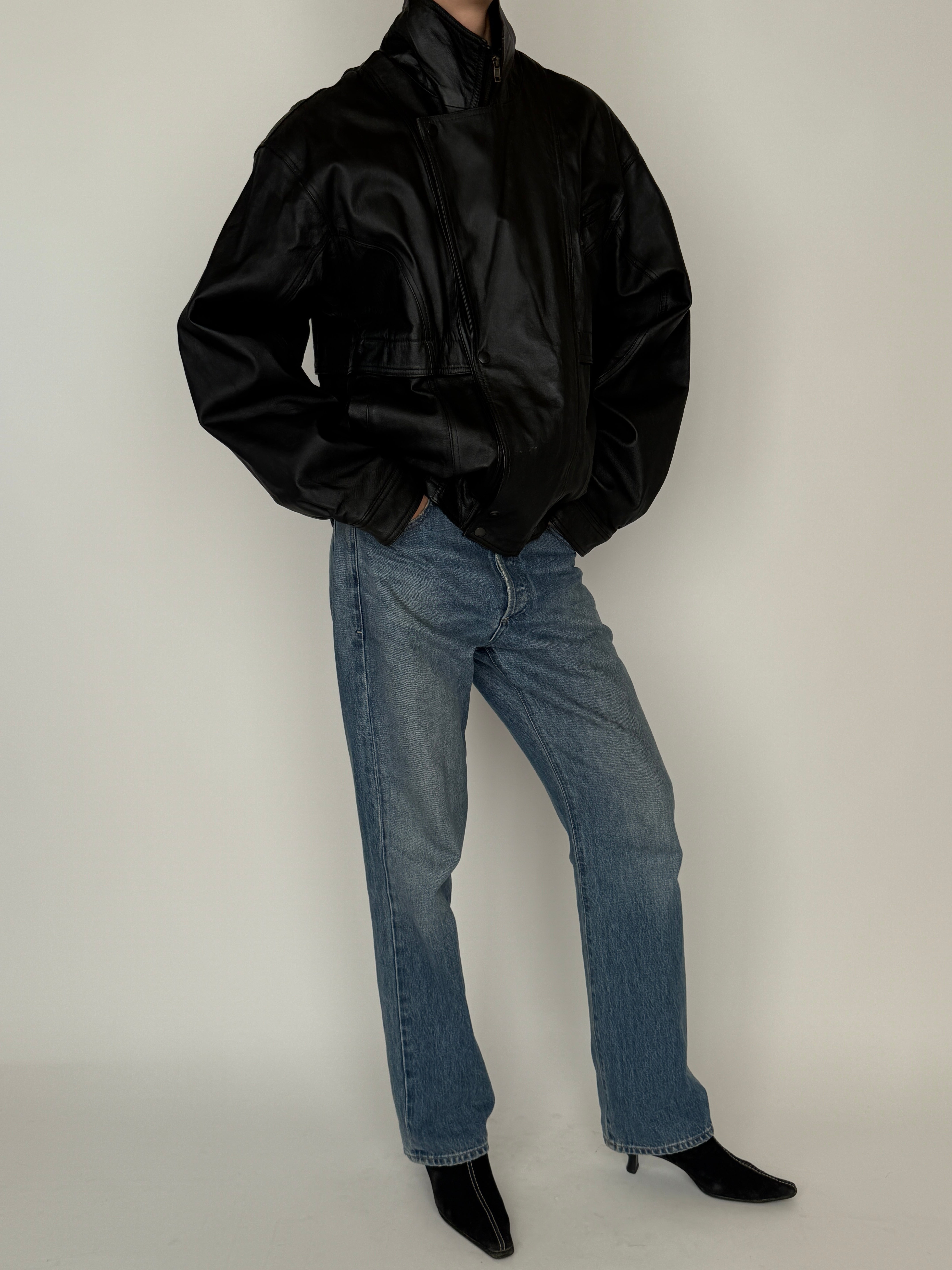 Vintage leather jacket black structured silhouette