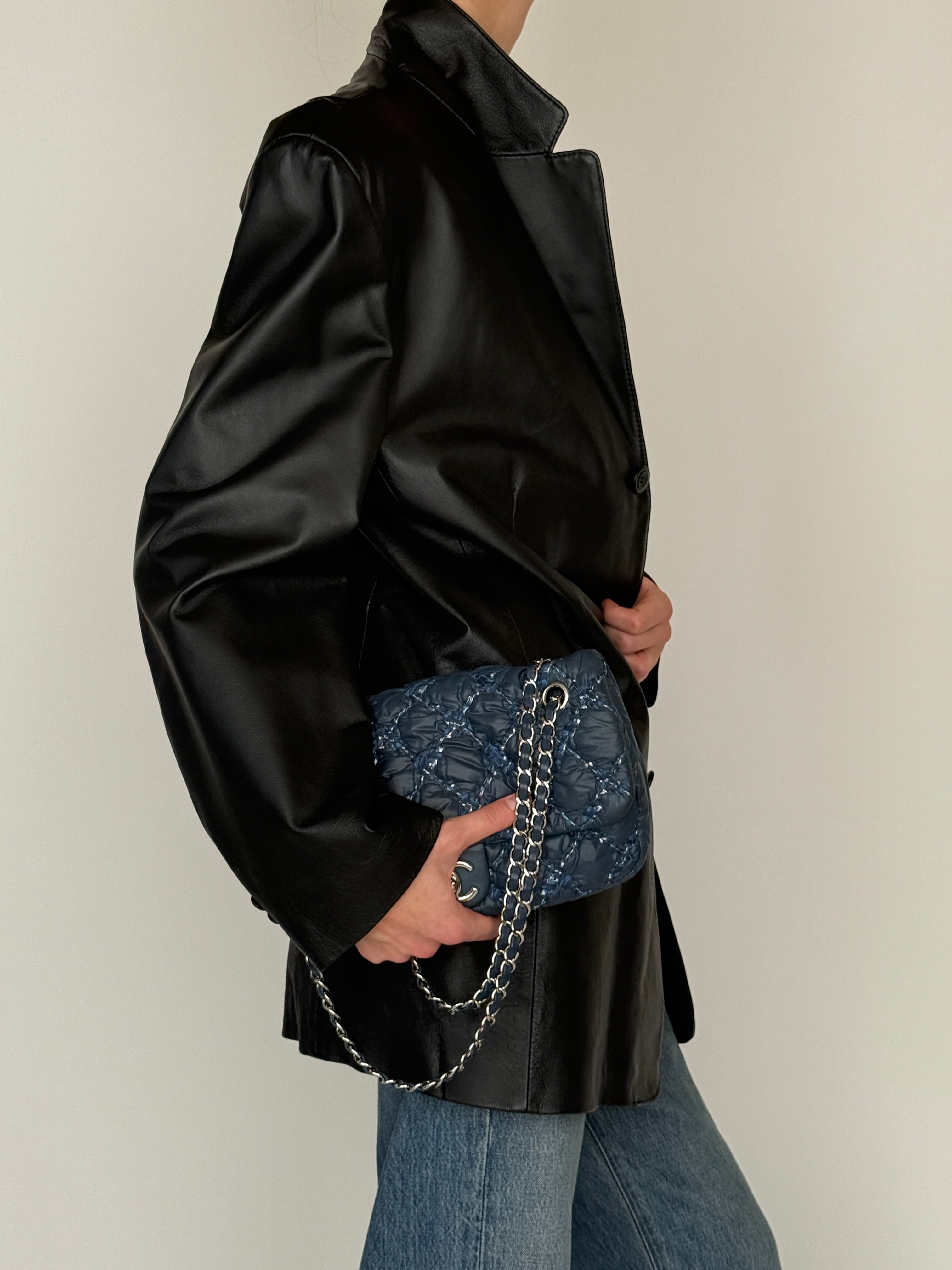 Vintage leather blazer black side view close-up