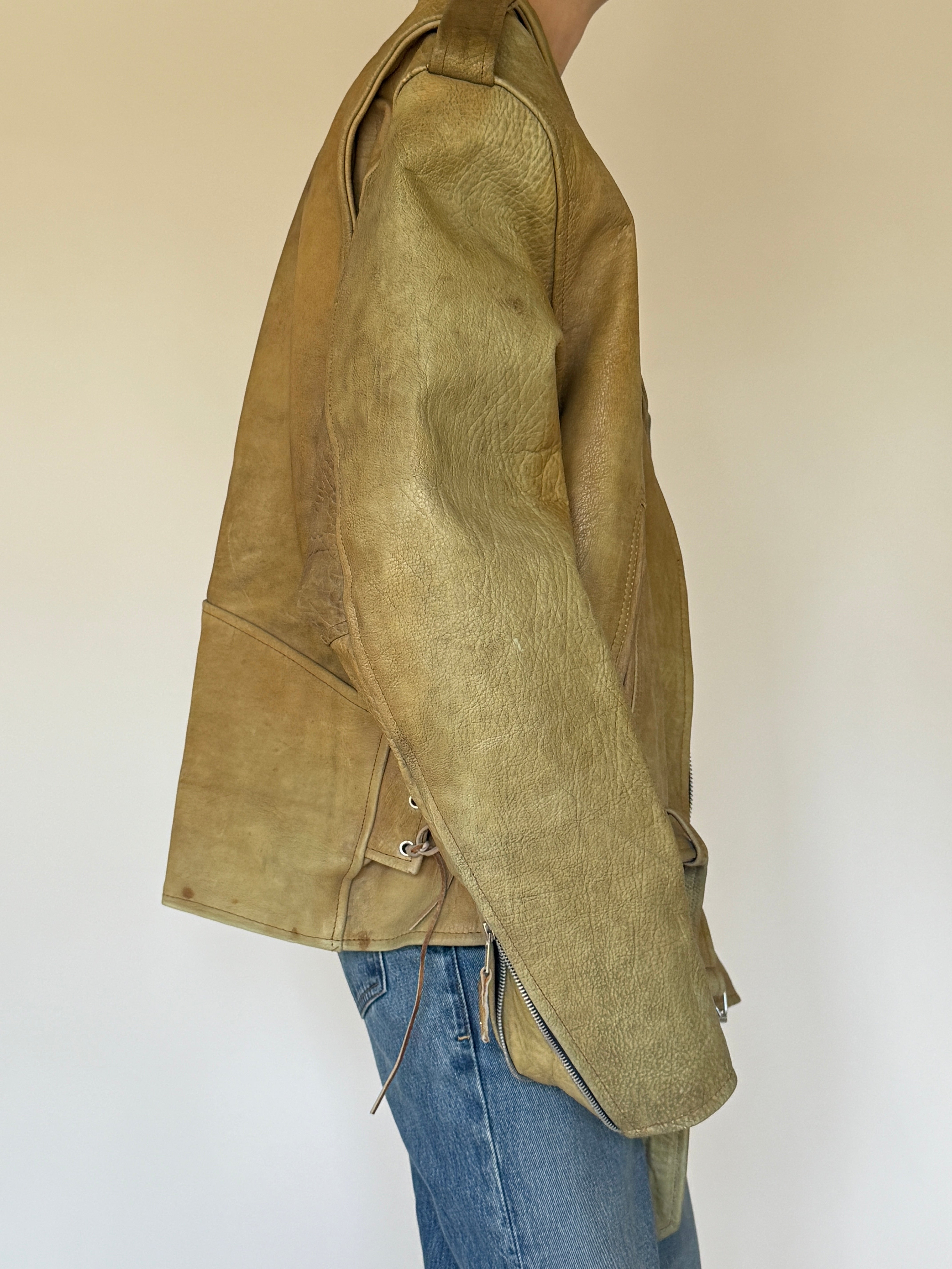 Vintage heavy beige leather biker jacket side view