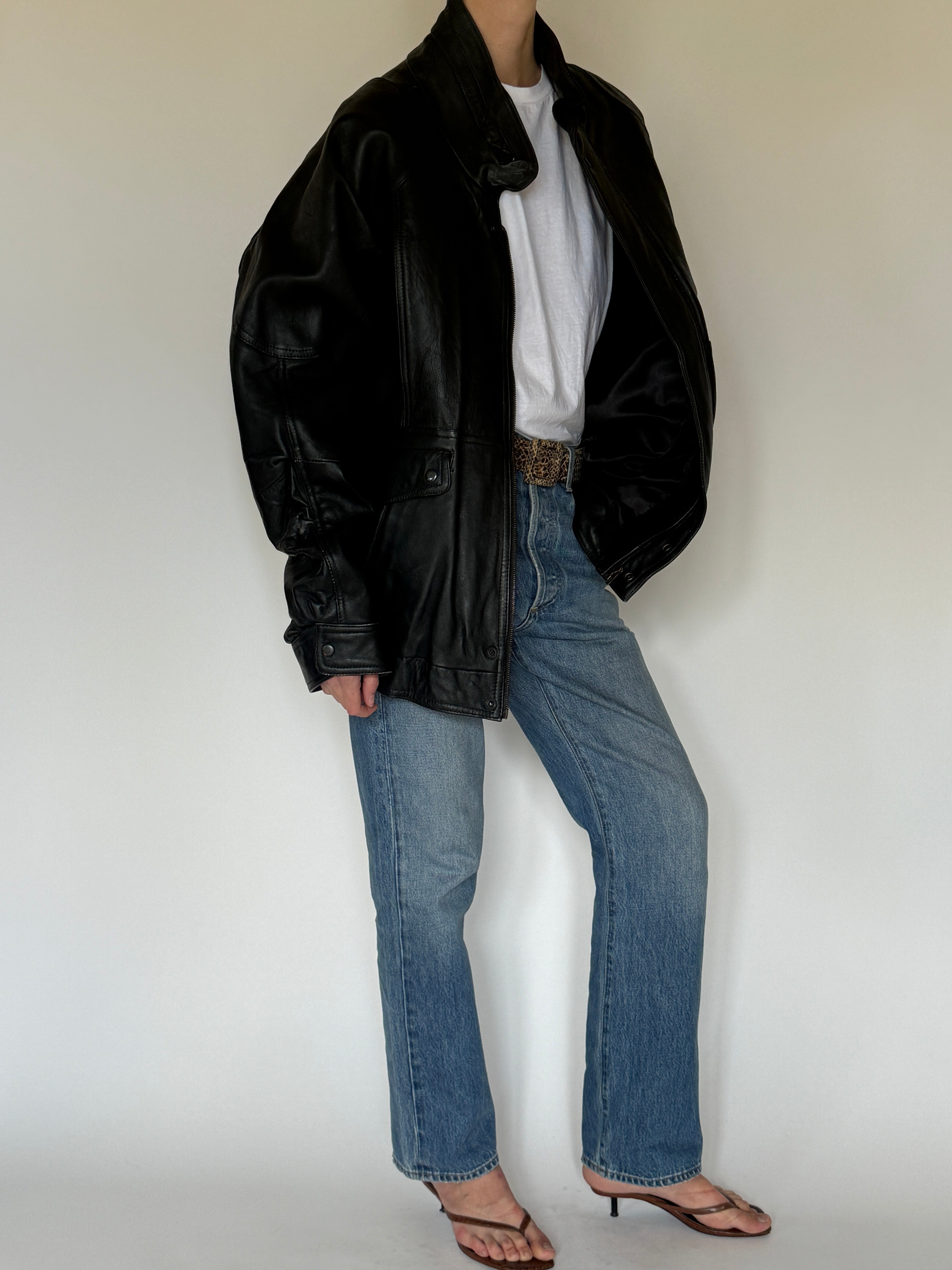 Vintage oversized leather jacket black front pocket detail