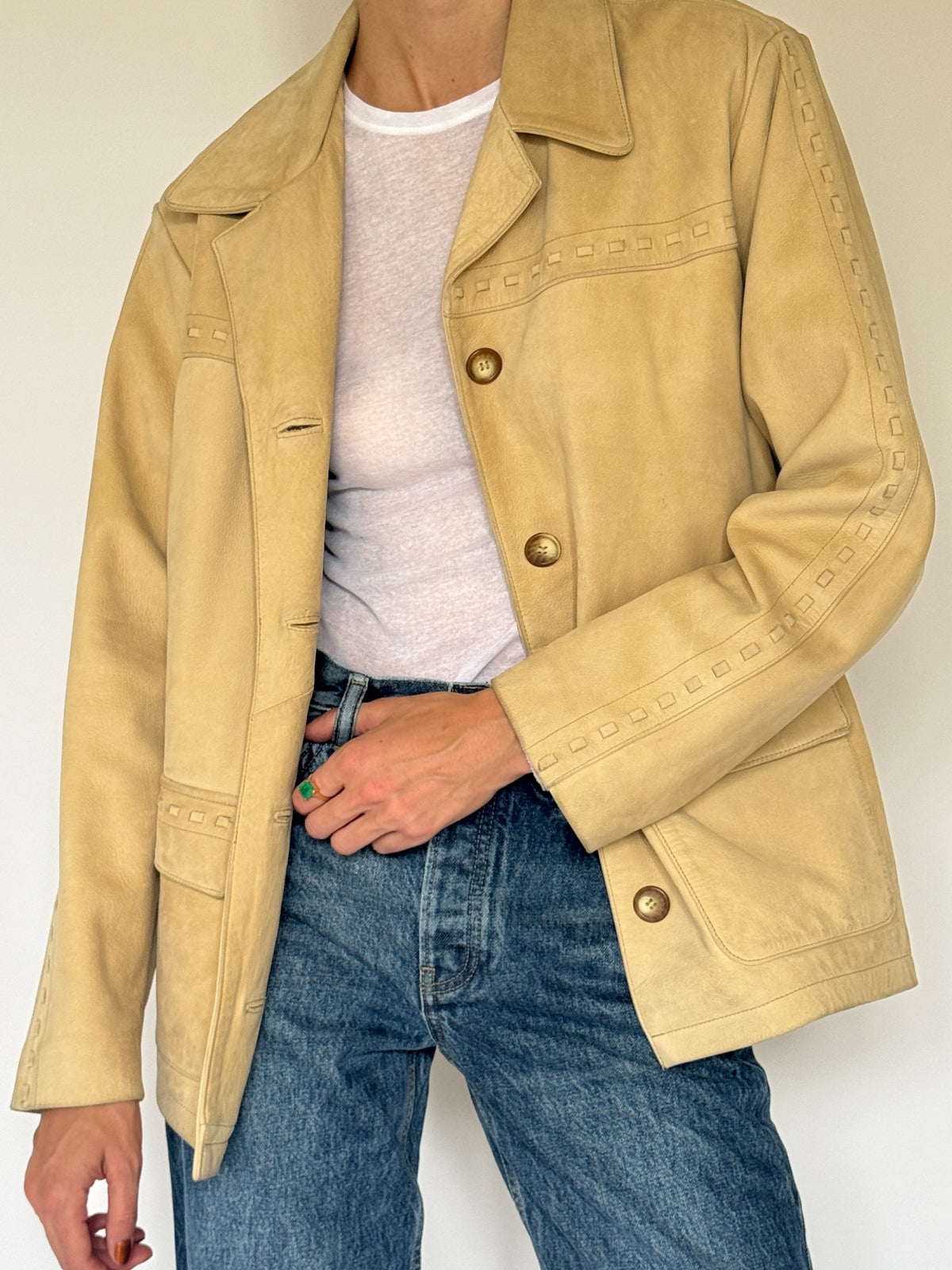 Vintage western-inspired leather jacket tan pocket detail