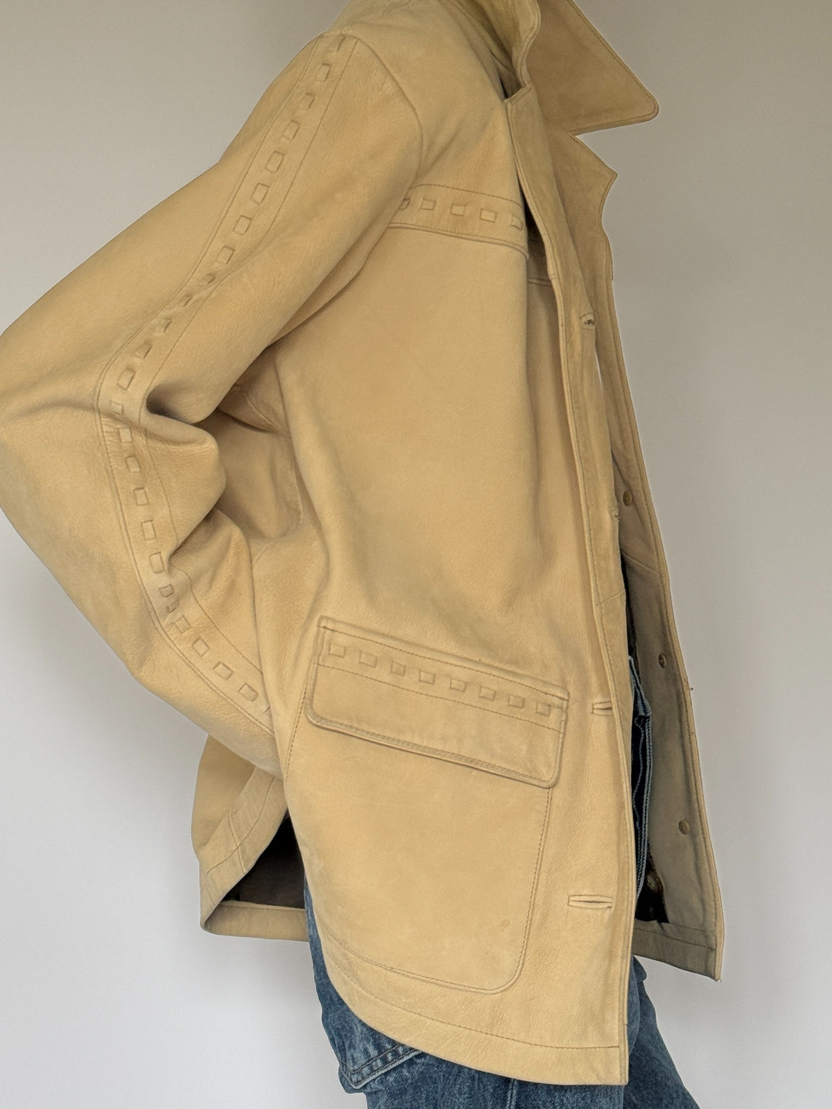 Vintage western-inspired leather jacket tan side view