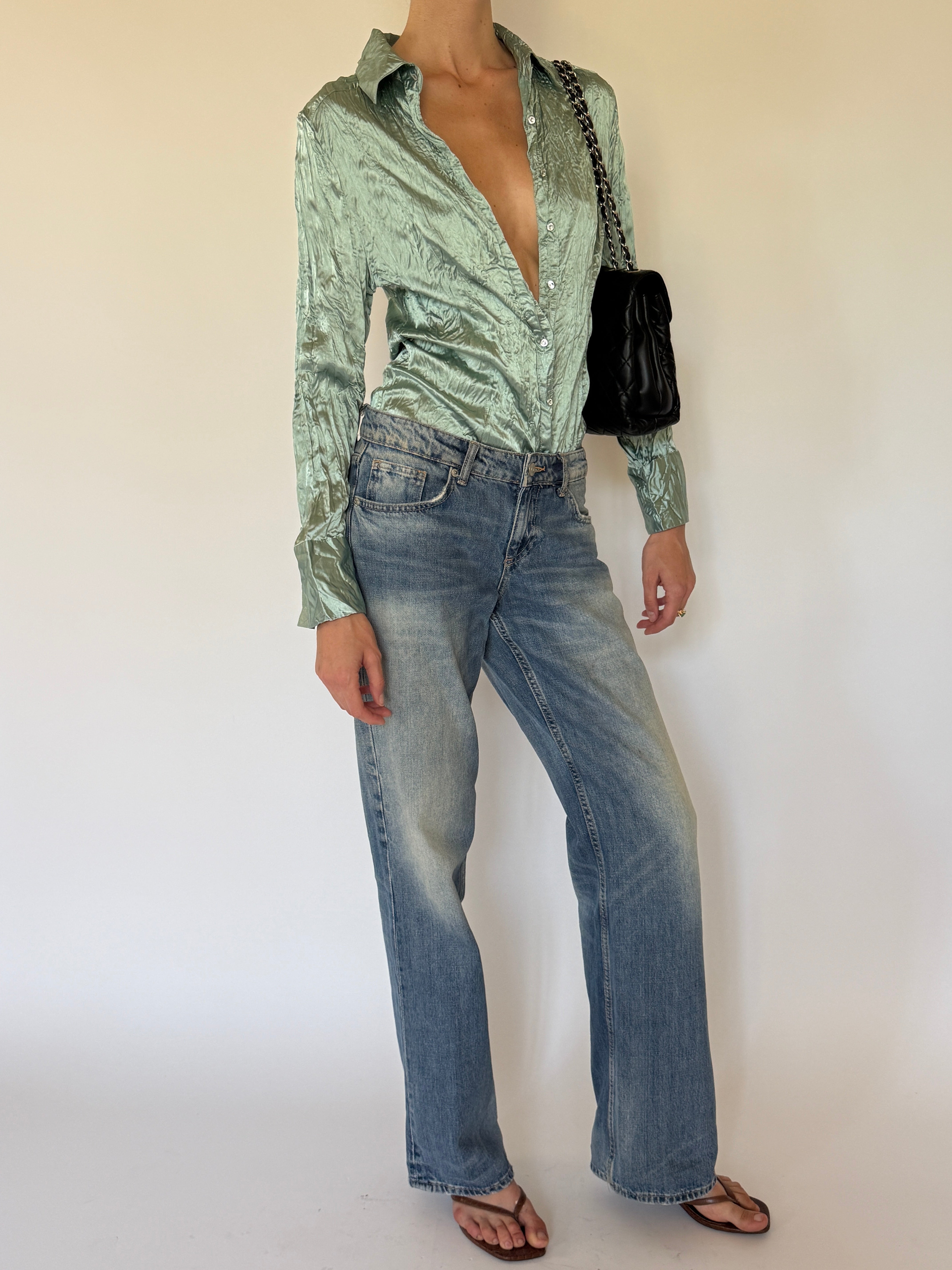 Vintage sage green shimmer shirt angled front view