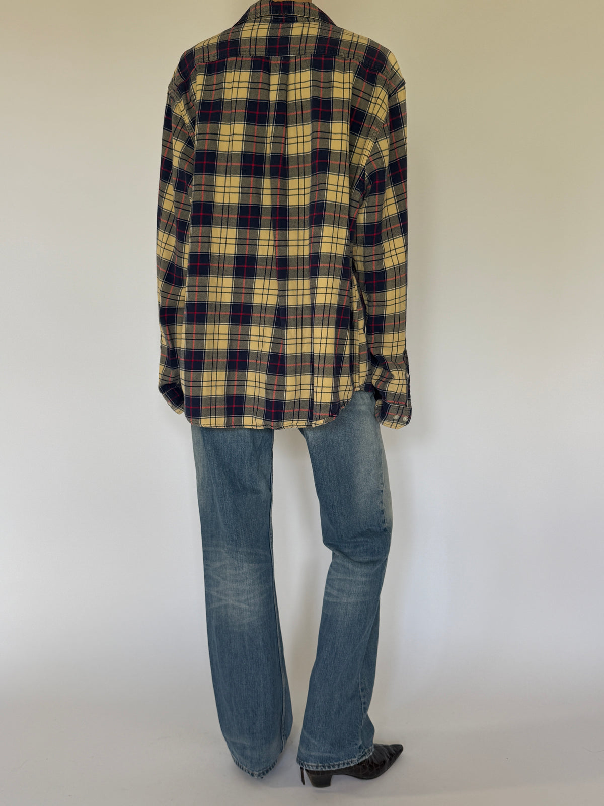 Vintage yellow plaid flannel shirt back view with oversized silhouette