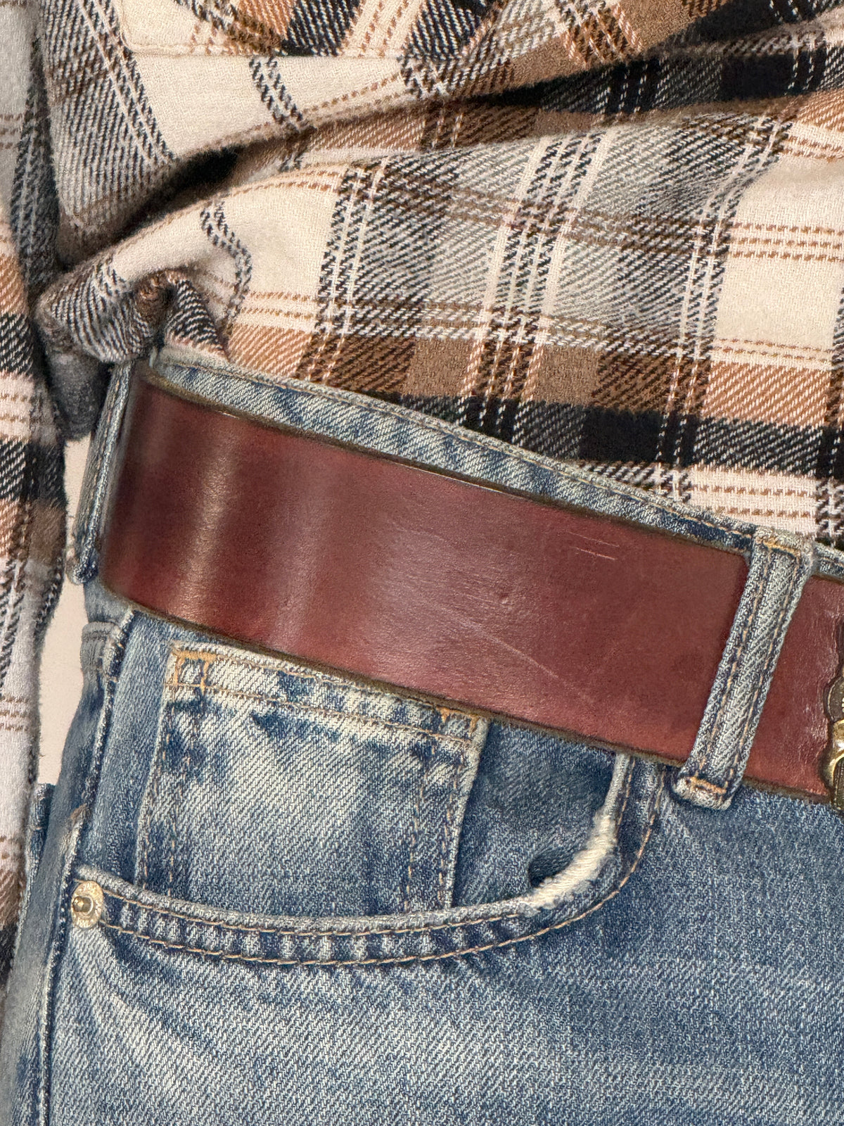 Vintage brown leather ram buckle belt side view