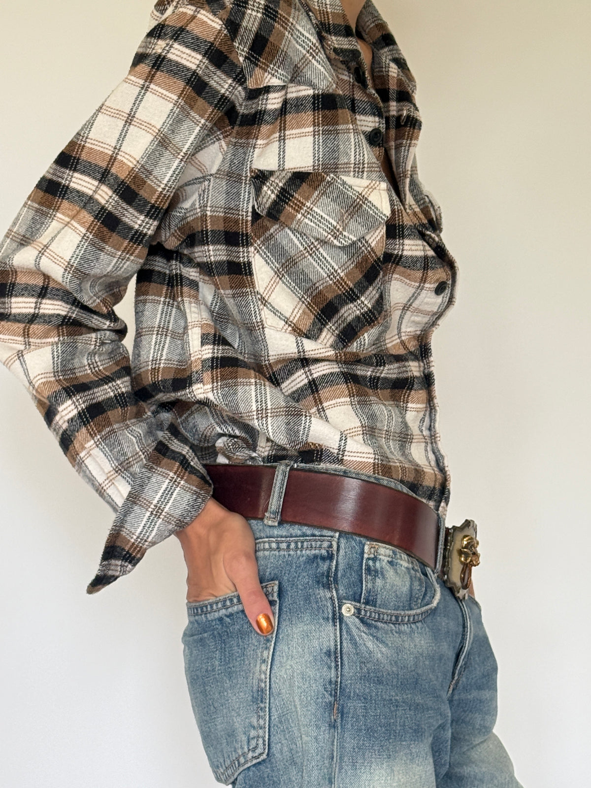 Vintage brown leather ram buckle belt side view