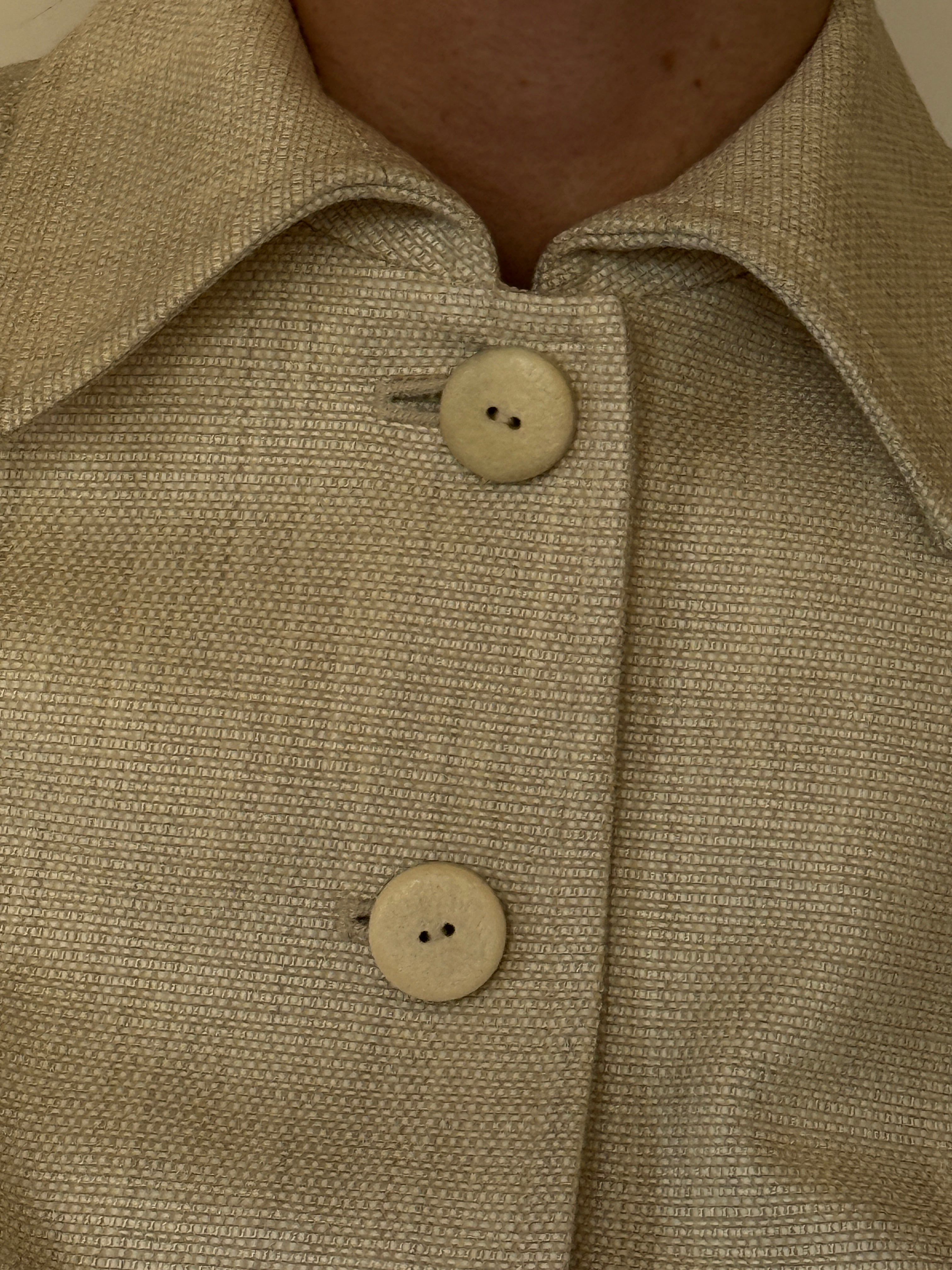 Vintage cream textured fabric close-up