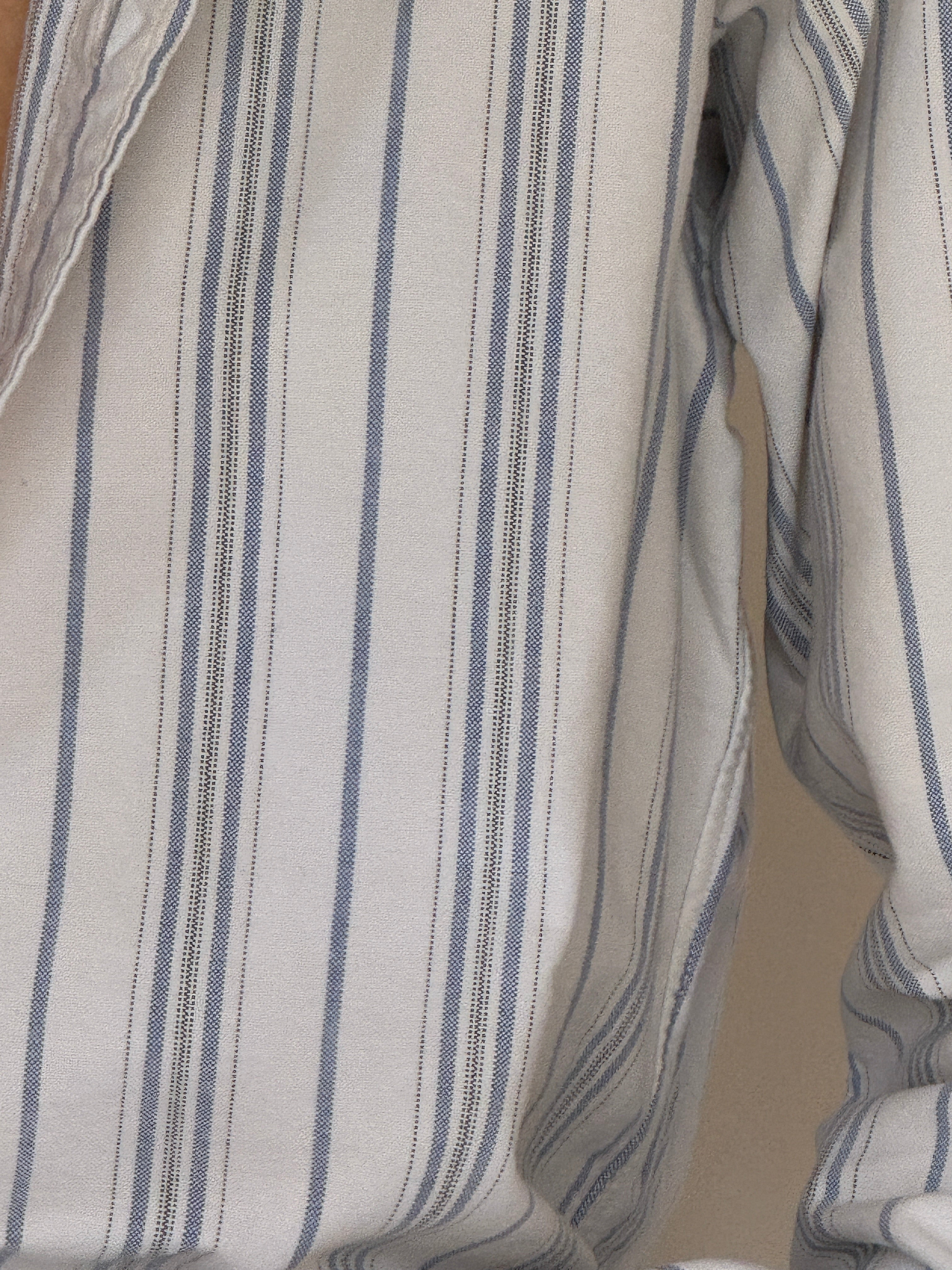 Vintage cotton stripe fabric close-up white blue