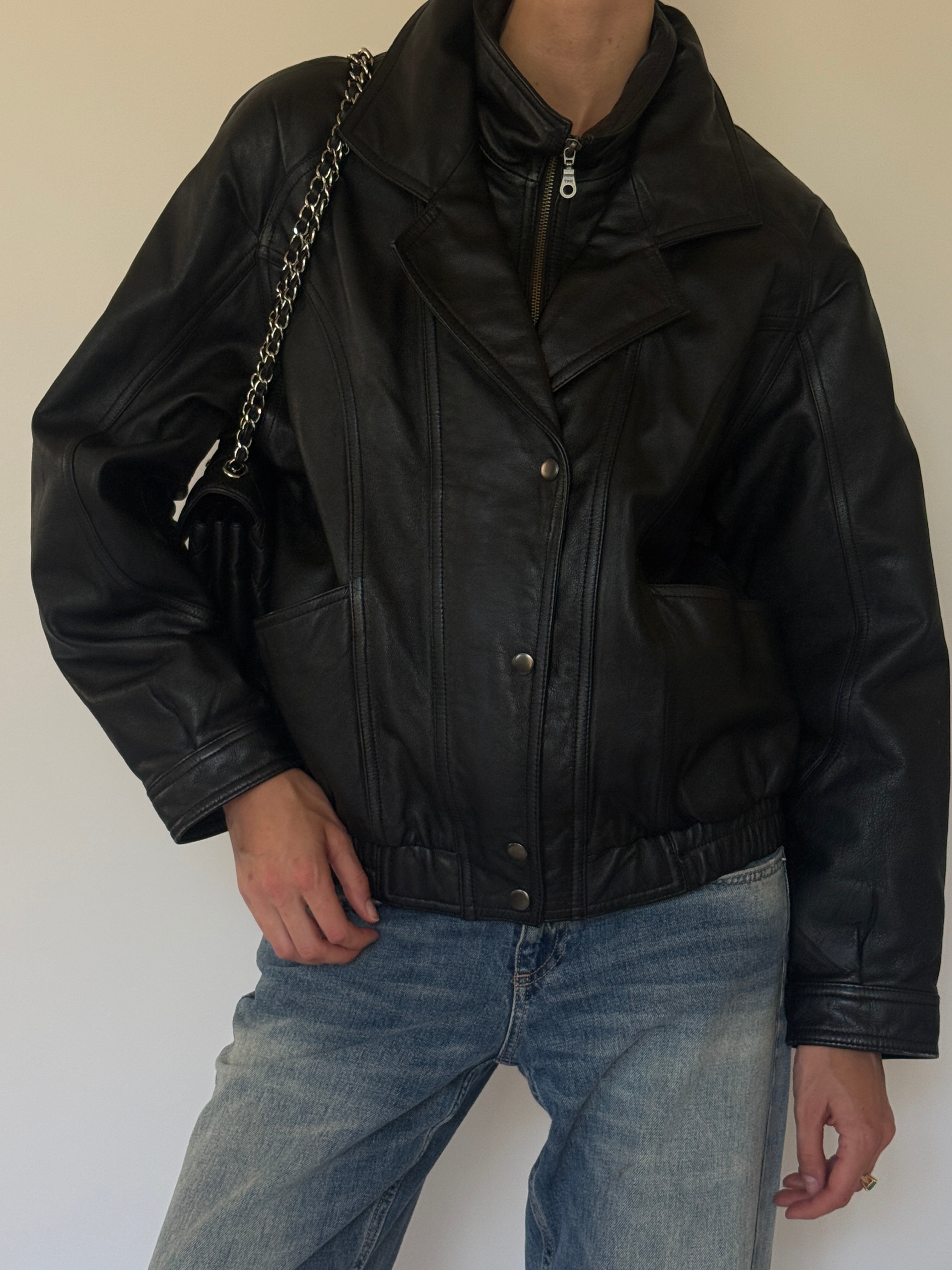 Vintage oversized black leather bomber jacket front view