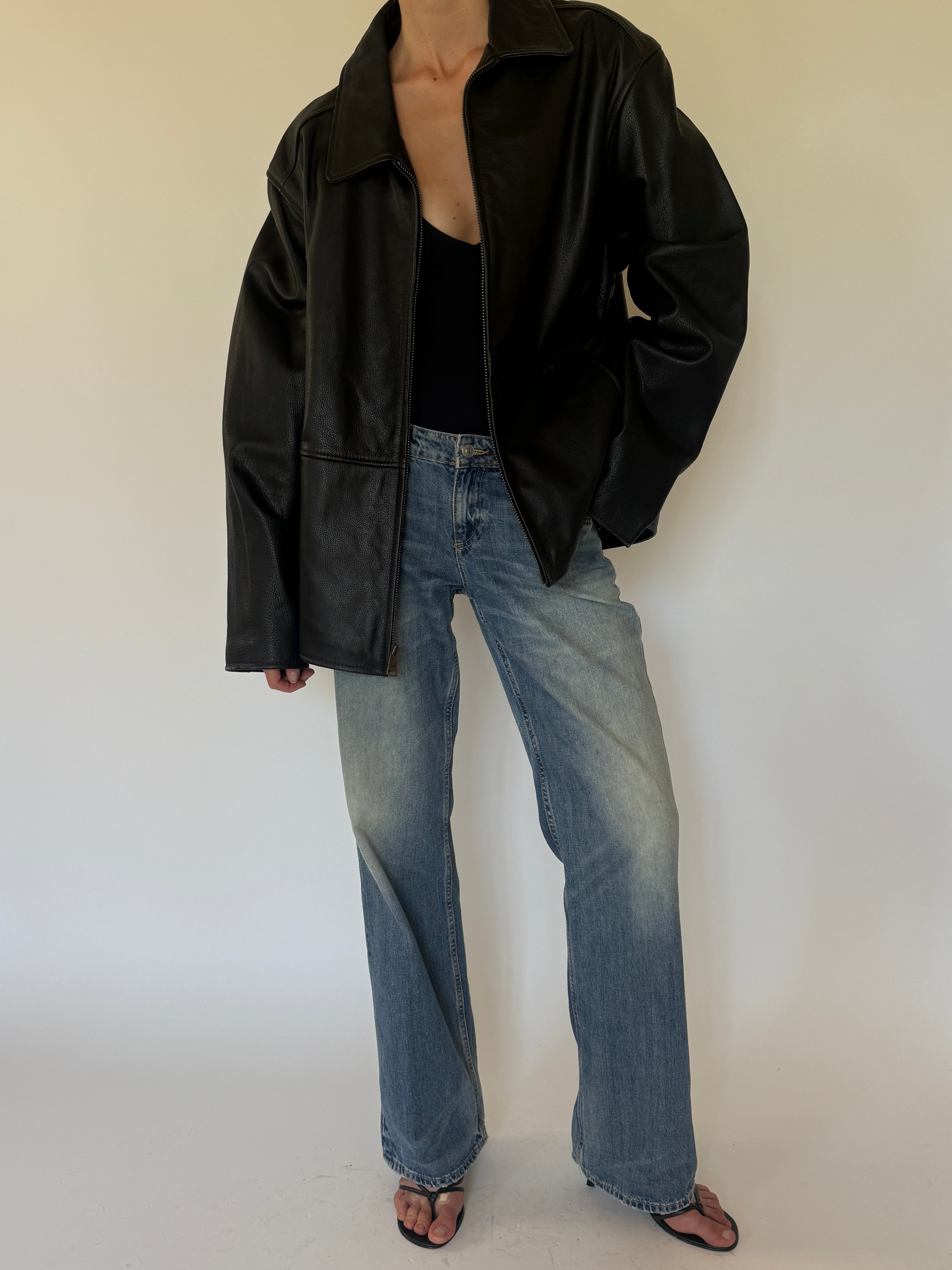 Vintage oversized black leather jacket front view
