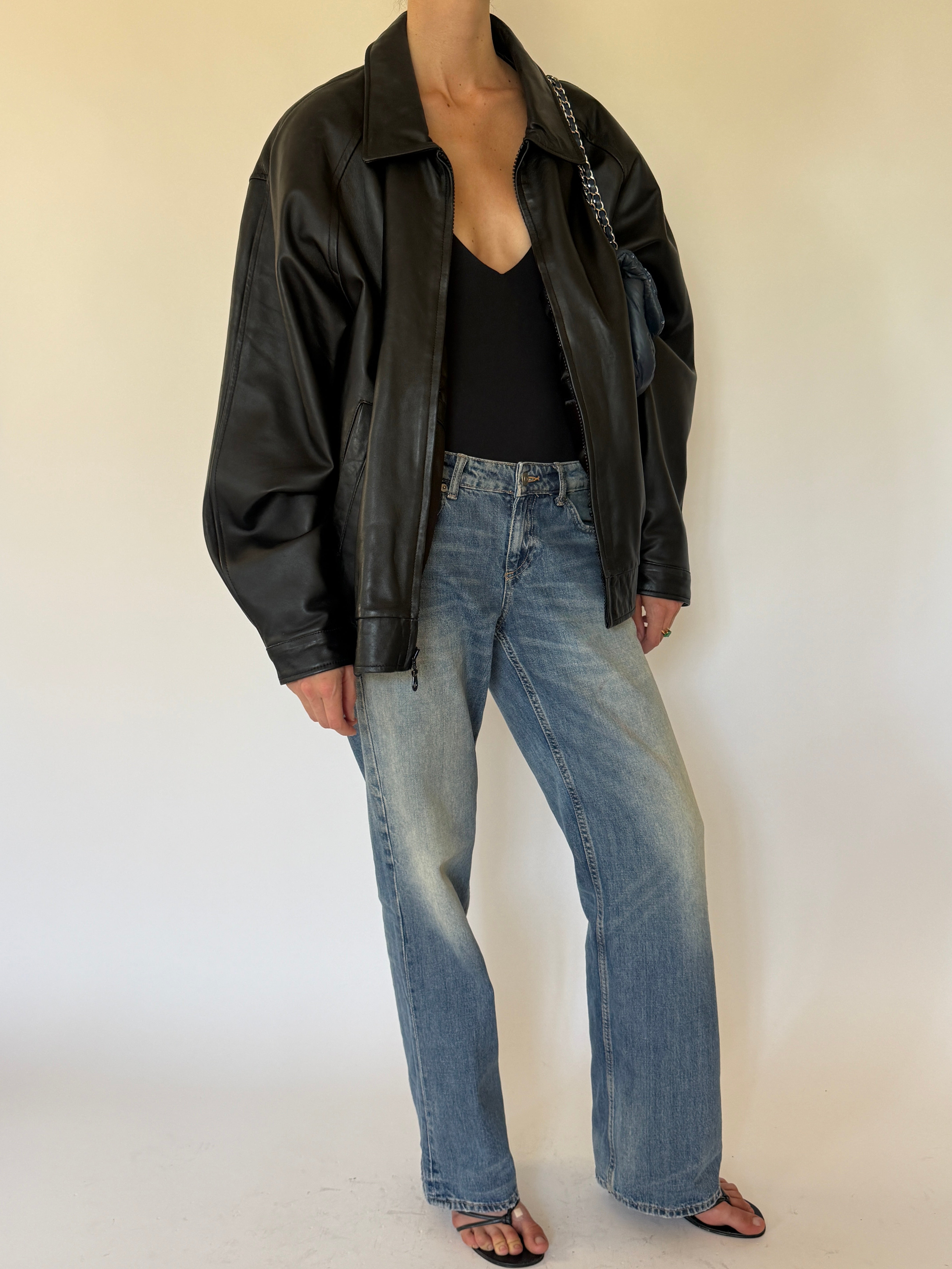 Vintage oversized black leather jacket front view