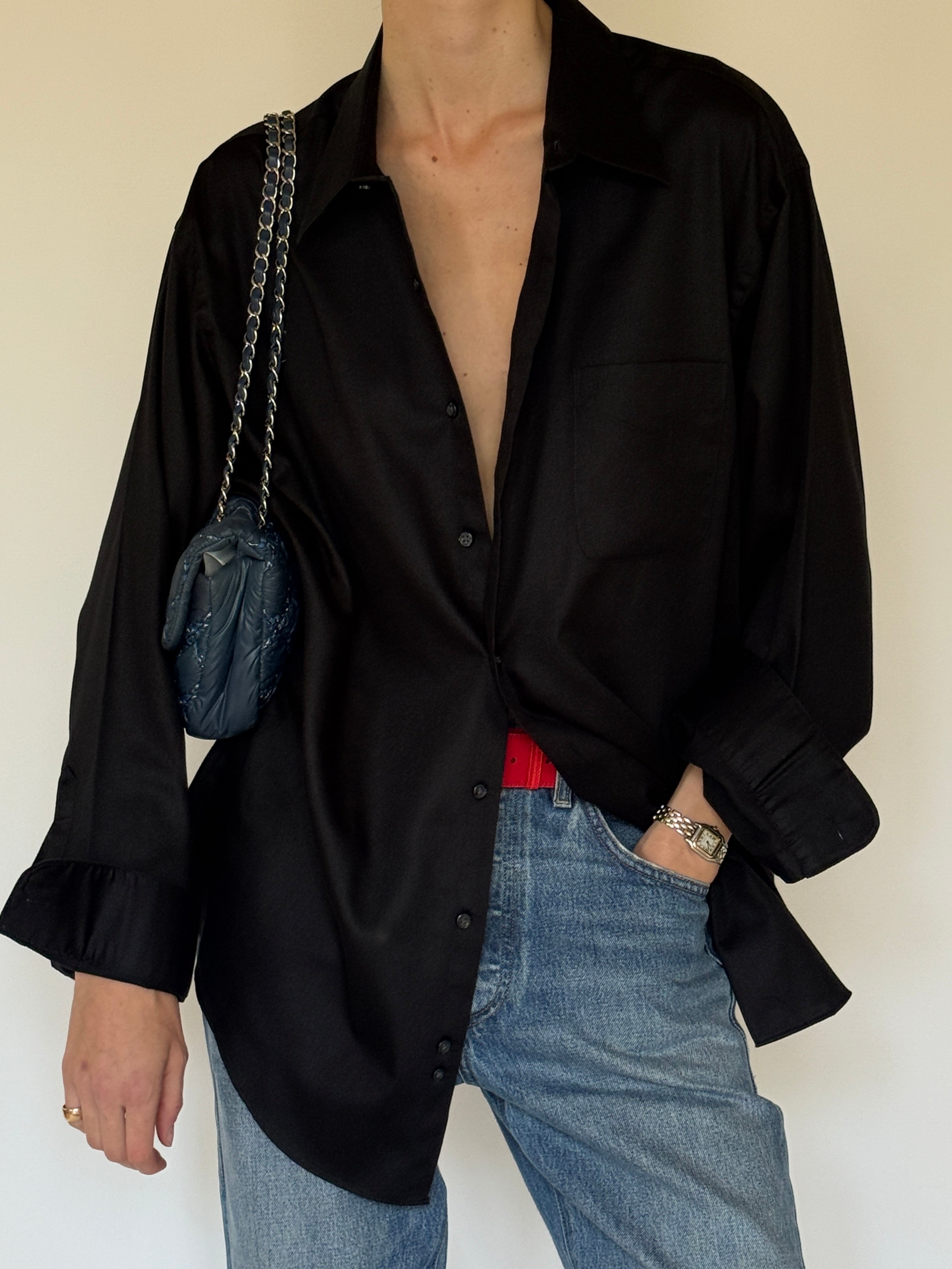 Vintage black shirt fabric close-up