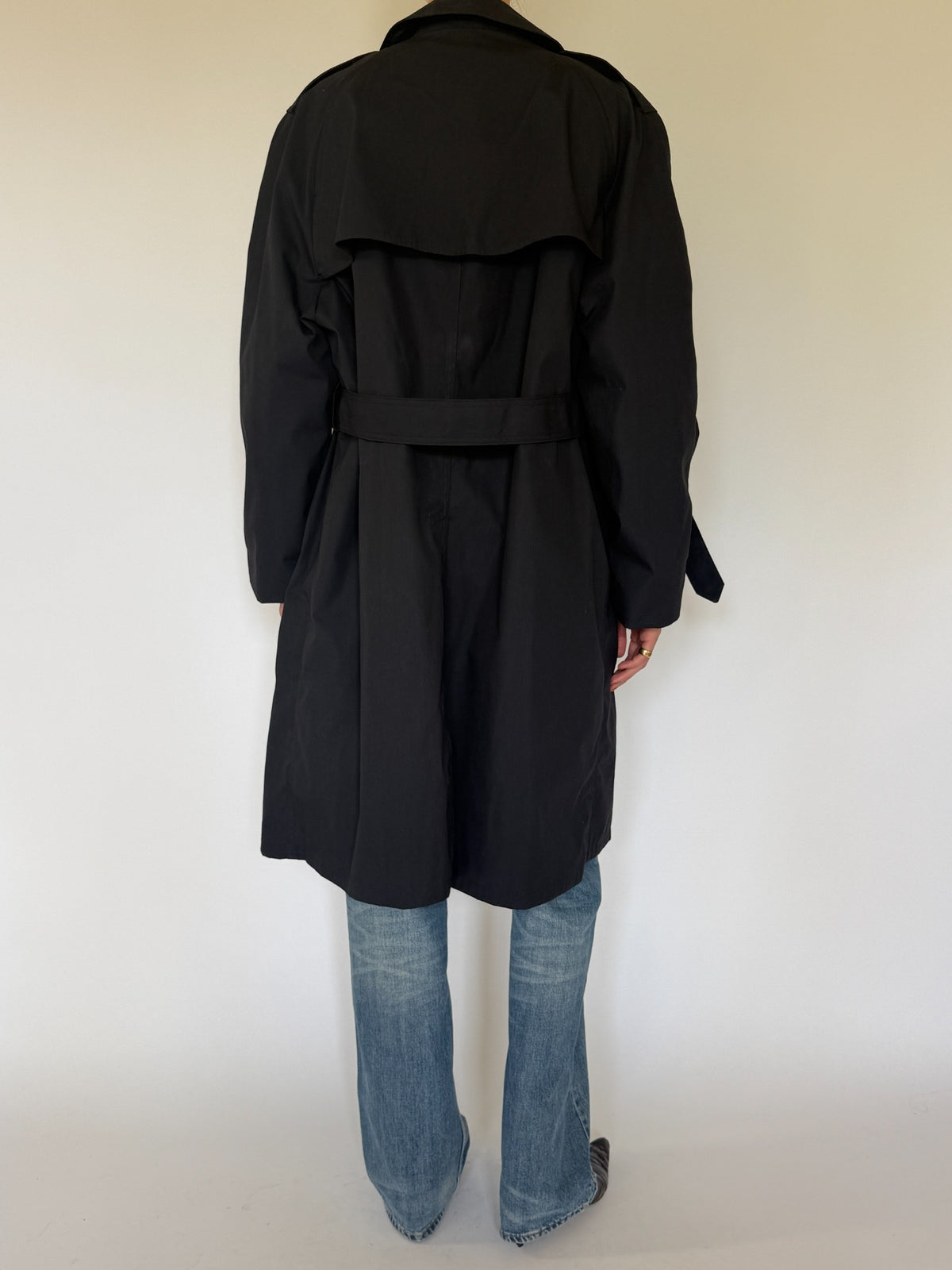 Vintage black belted trench coat back view
