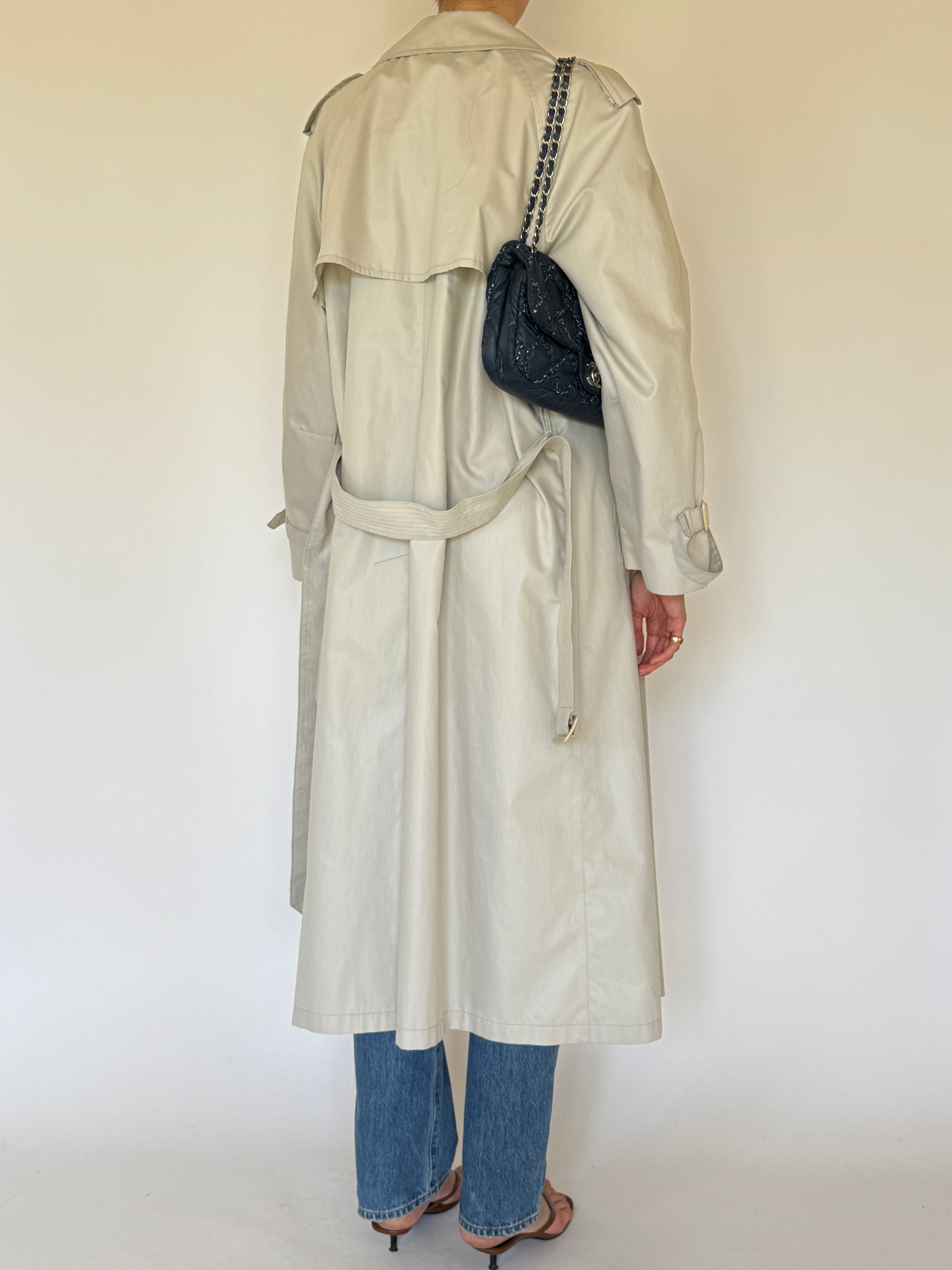 Vintage double-breasted trench coat back view
