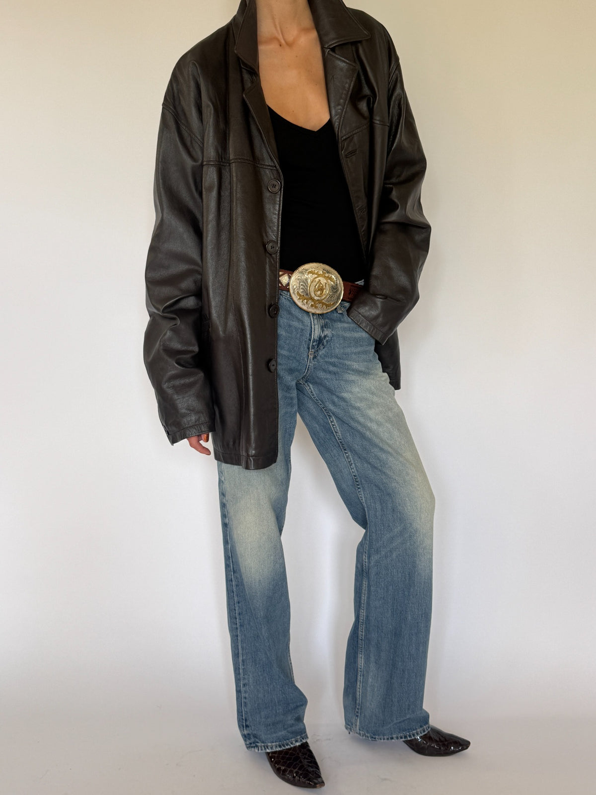 Vintage oversized dark brown leather jacket styled front view
