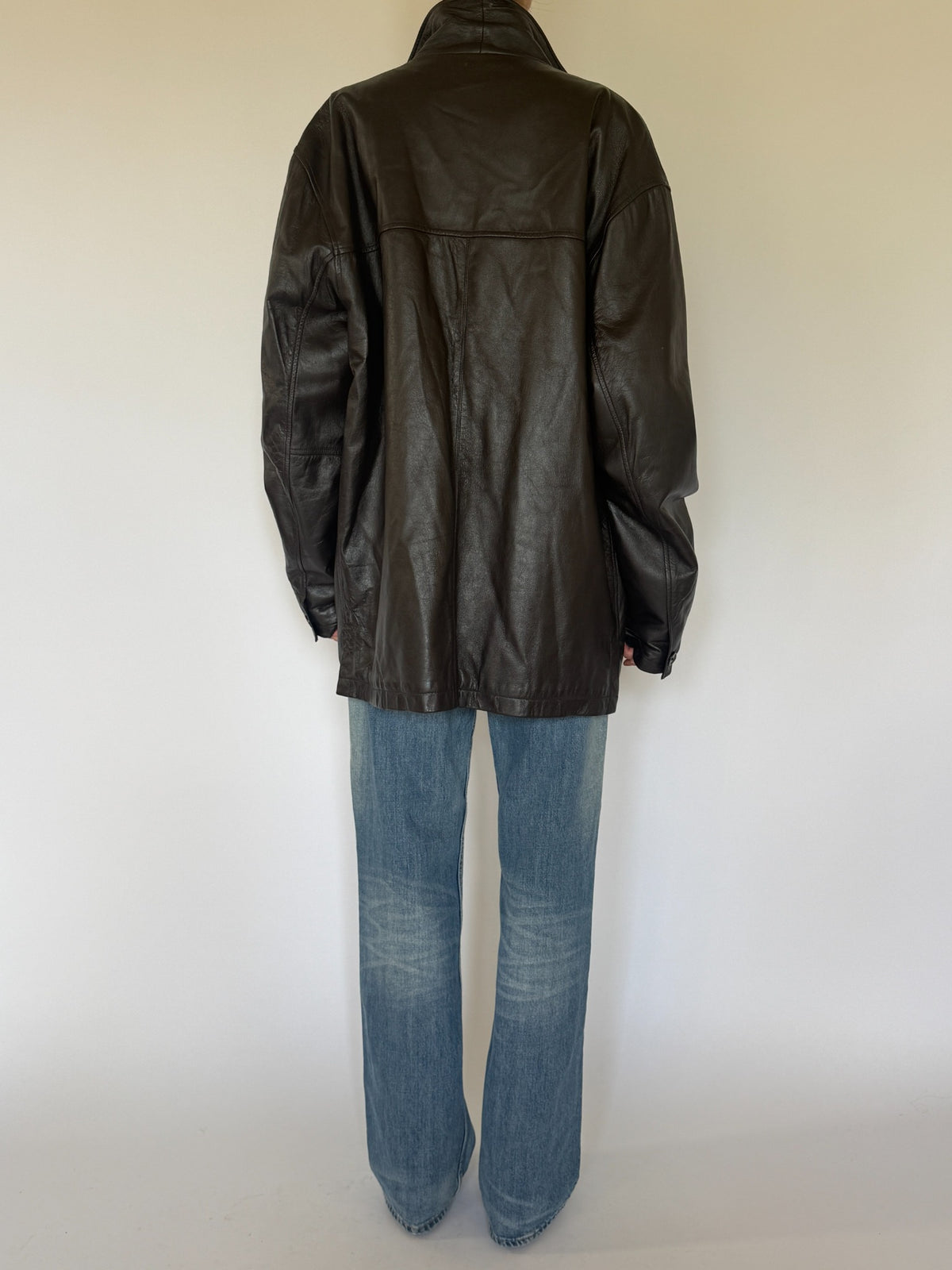 Vintage oversized dark brown leather jacket back view