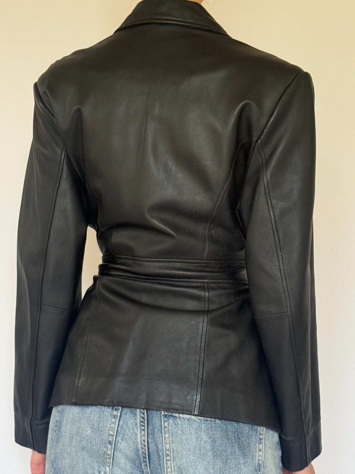 Vintage black leather belted jacket back seam detail