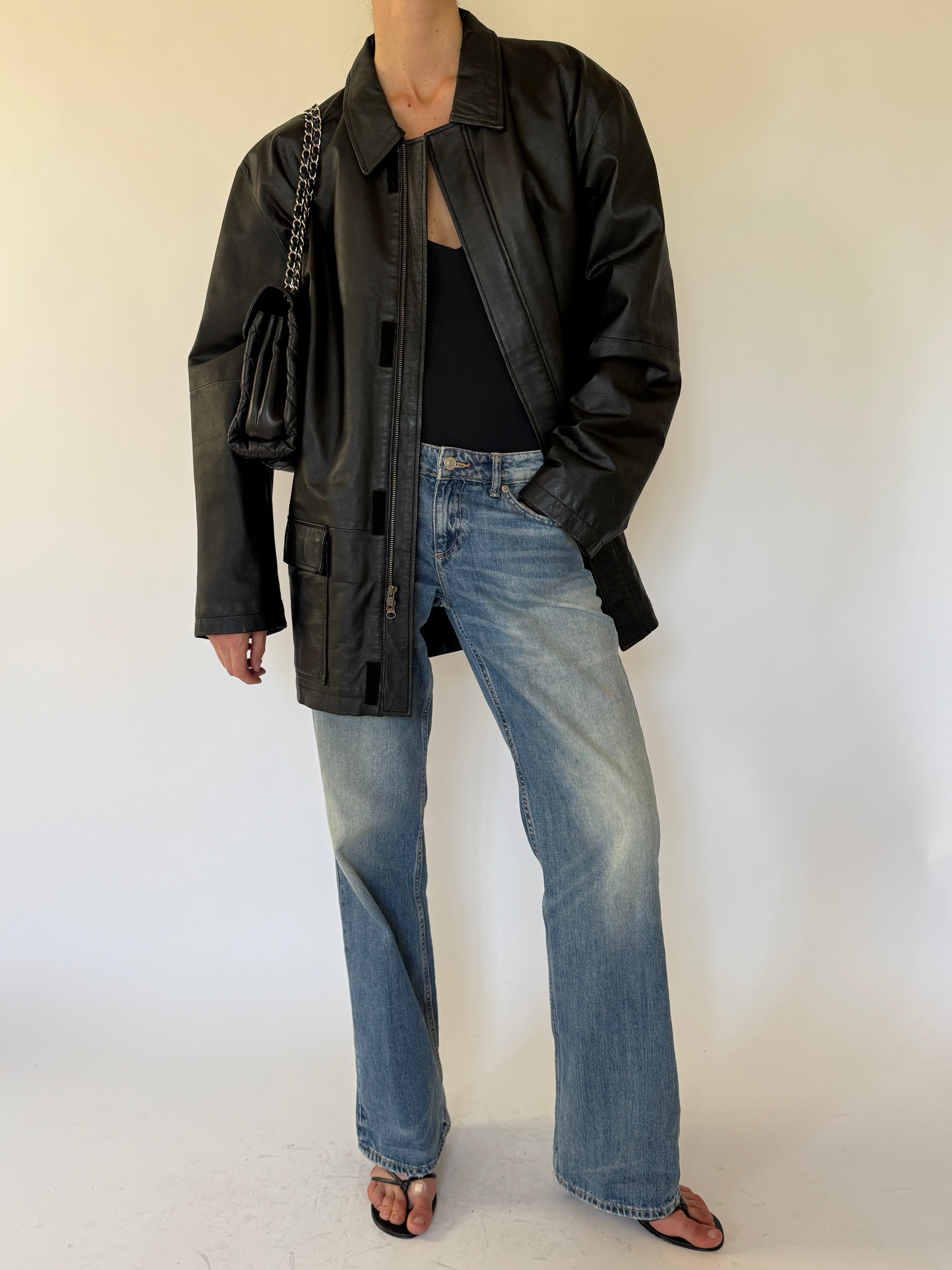 Vintage black leather jacket front view