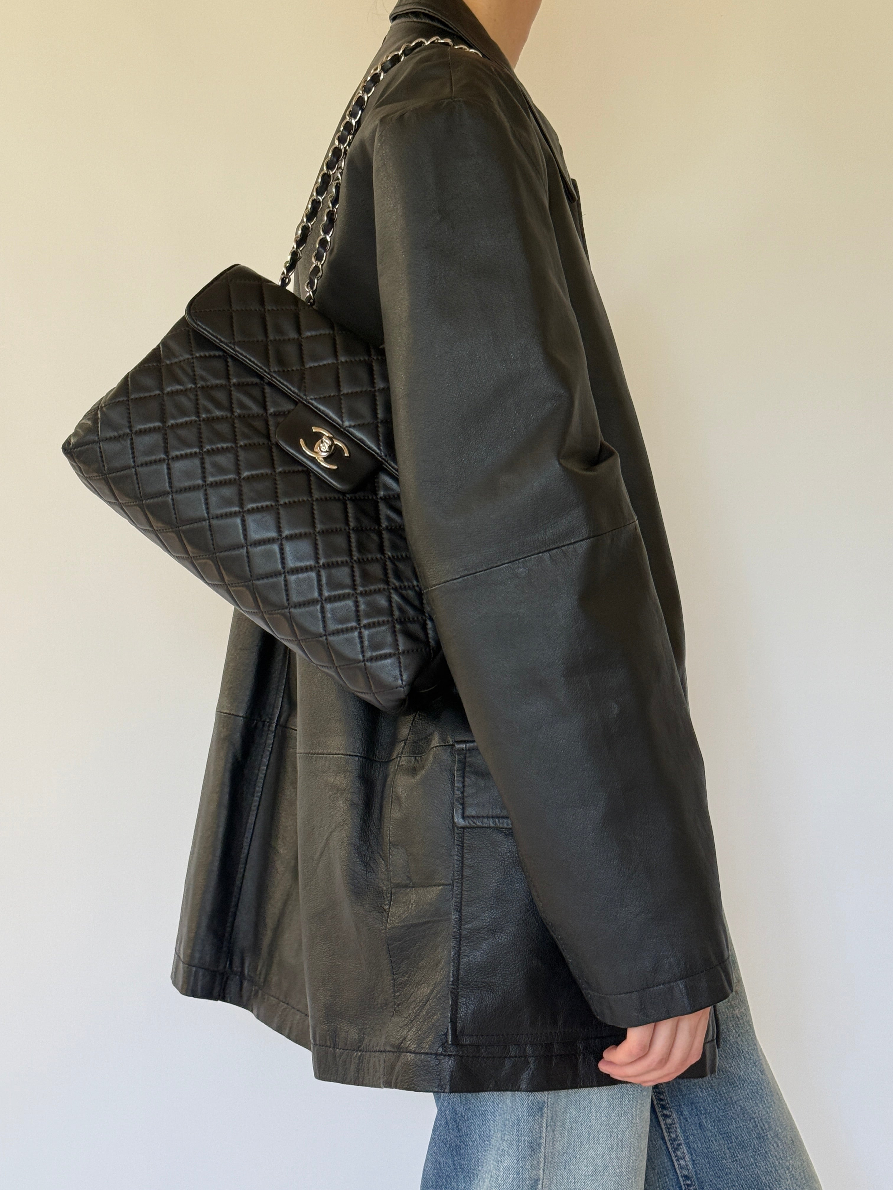 Vintage black leather jacket side view