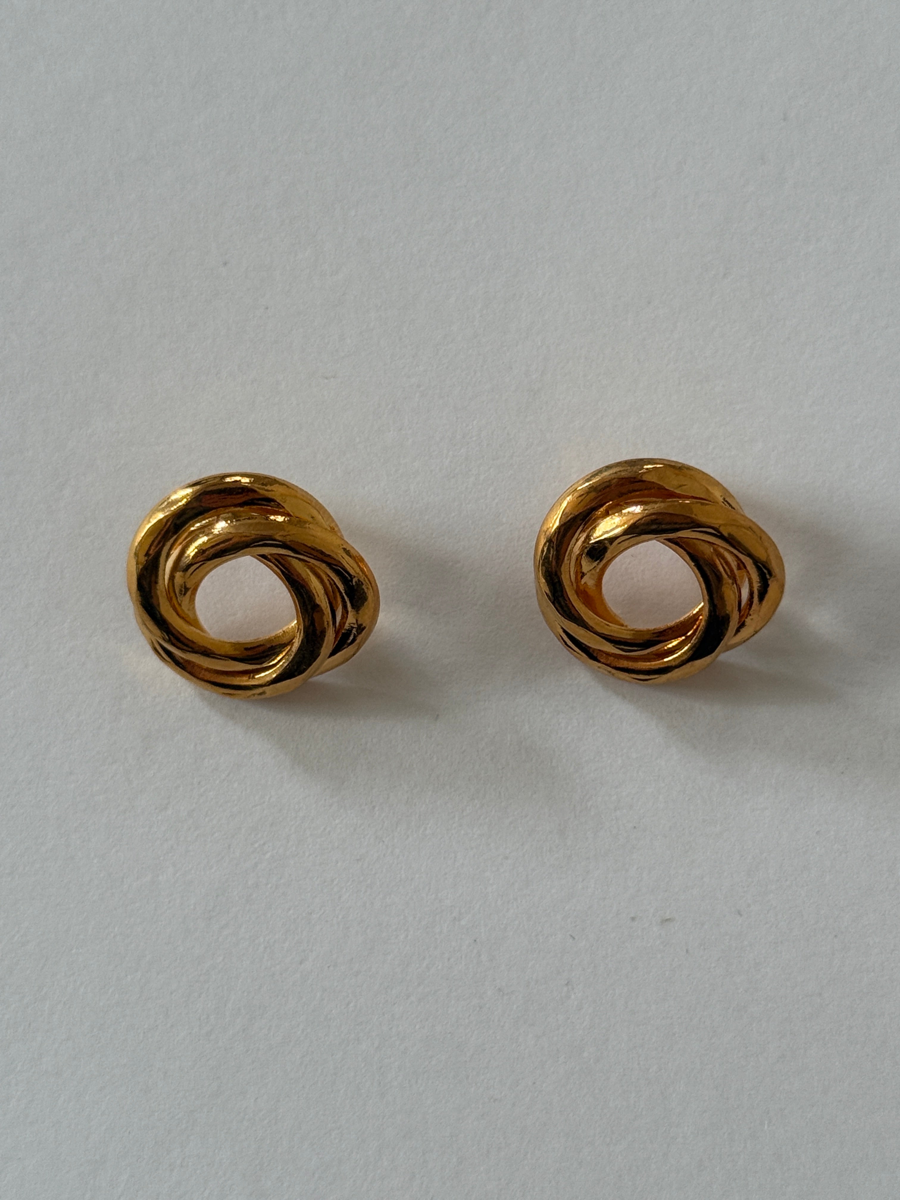 Vintage gold-tone knot stud earrings front view