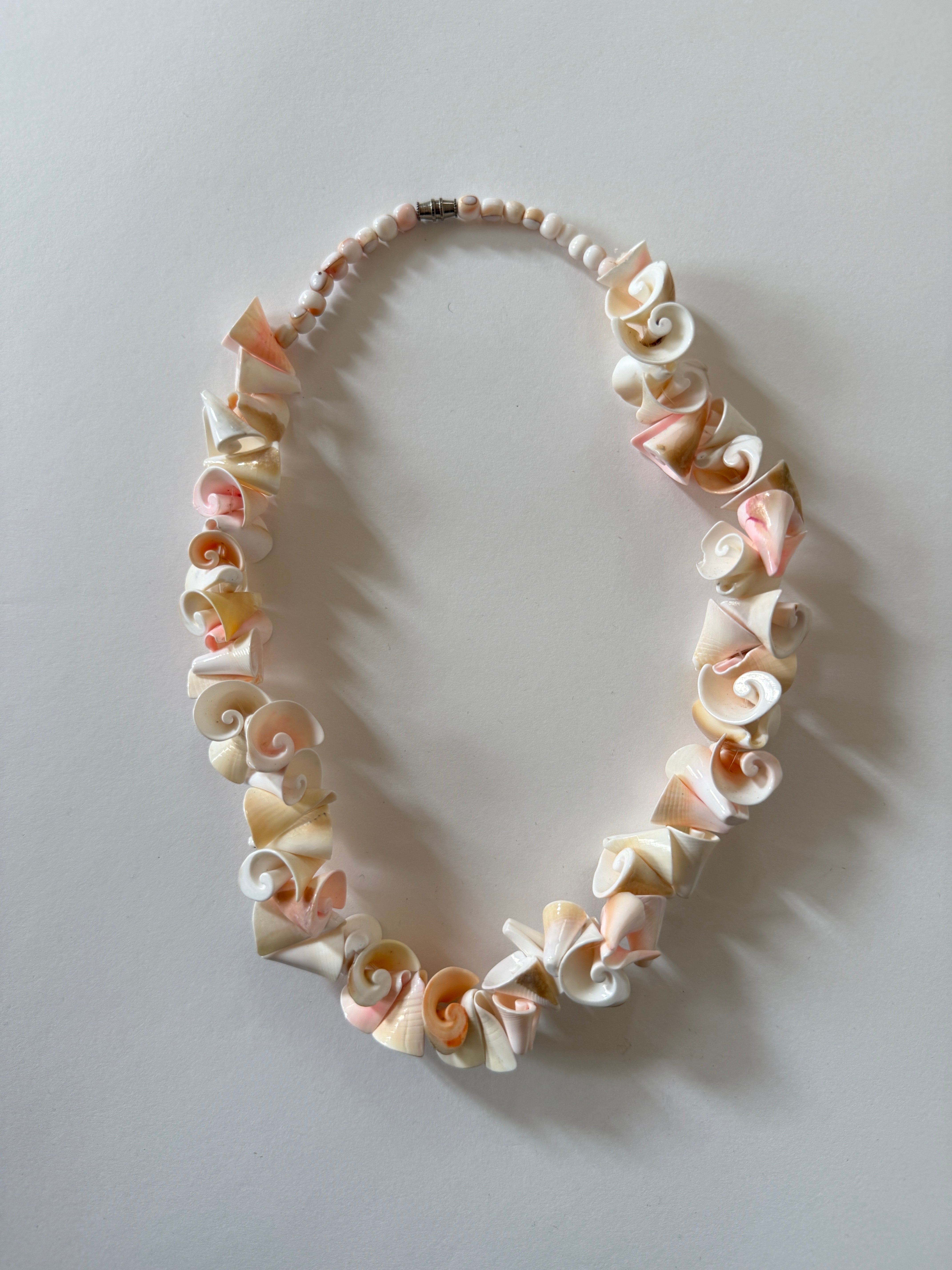Vintage hand-carved shell statement necklace with spiral shells ivory blush