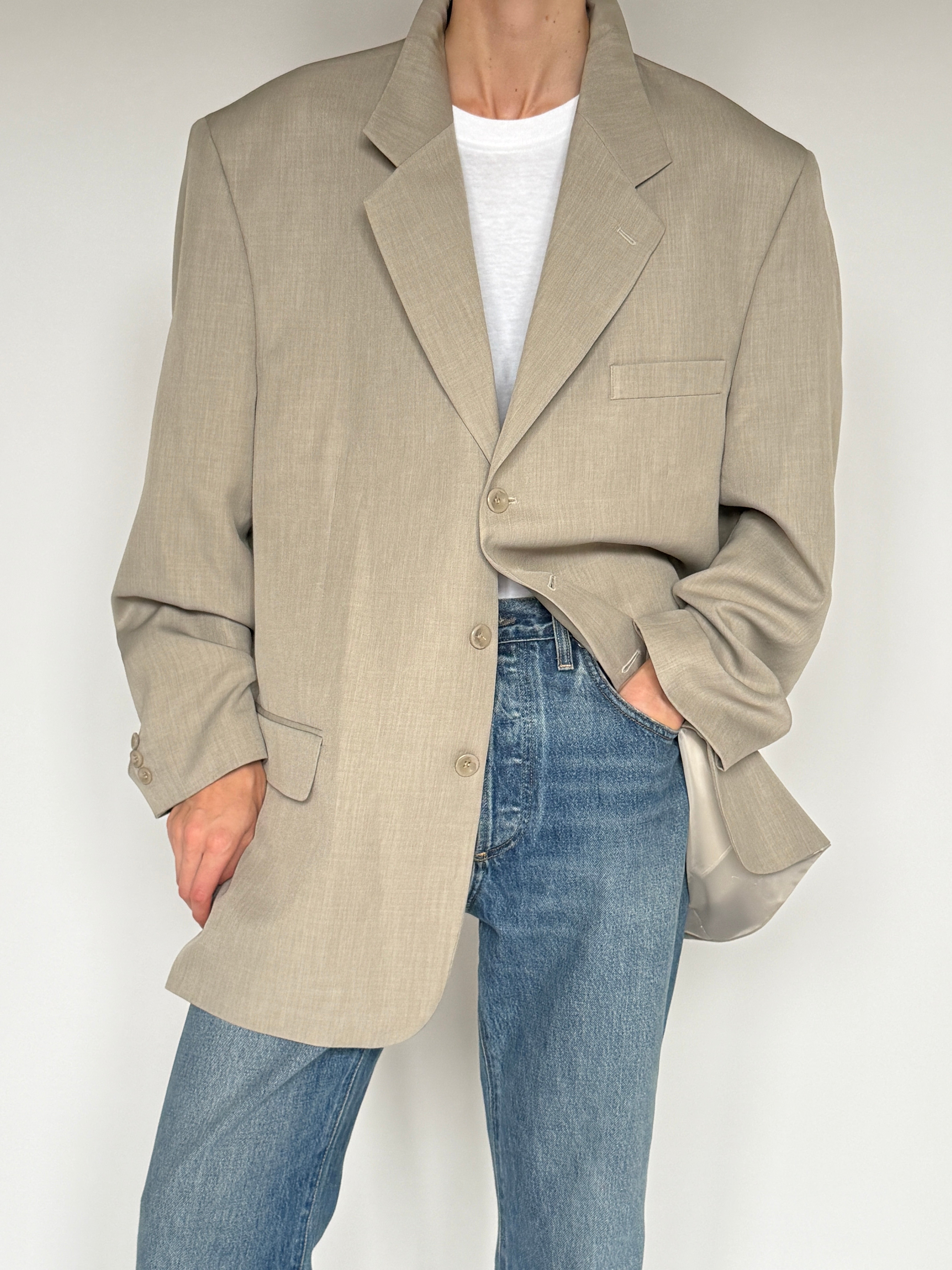 Vintage beige blazer fabric close-up