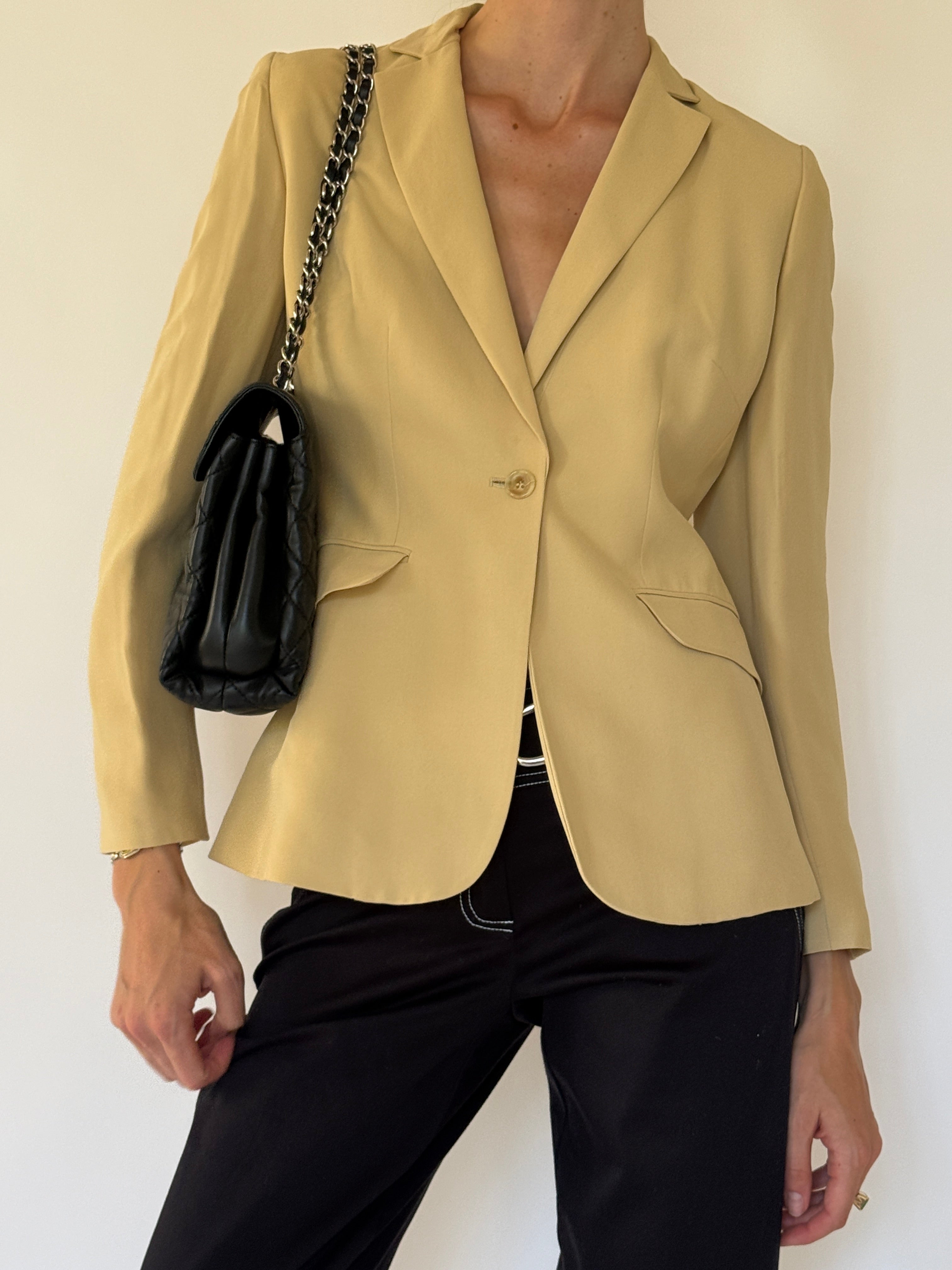 Vintage beige blazer fabric close-up