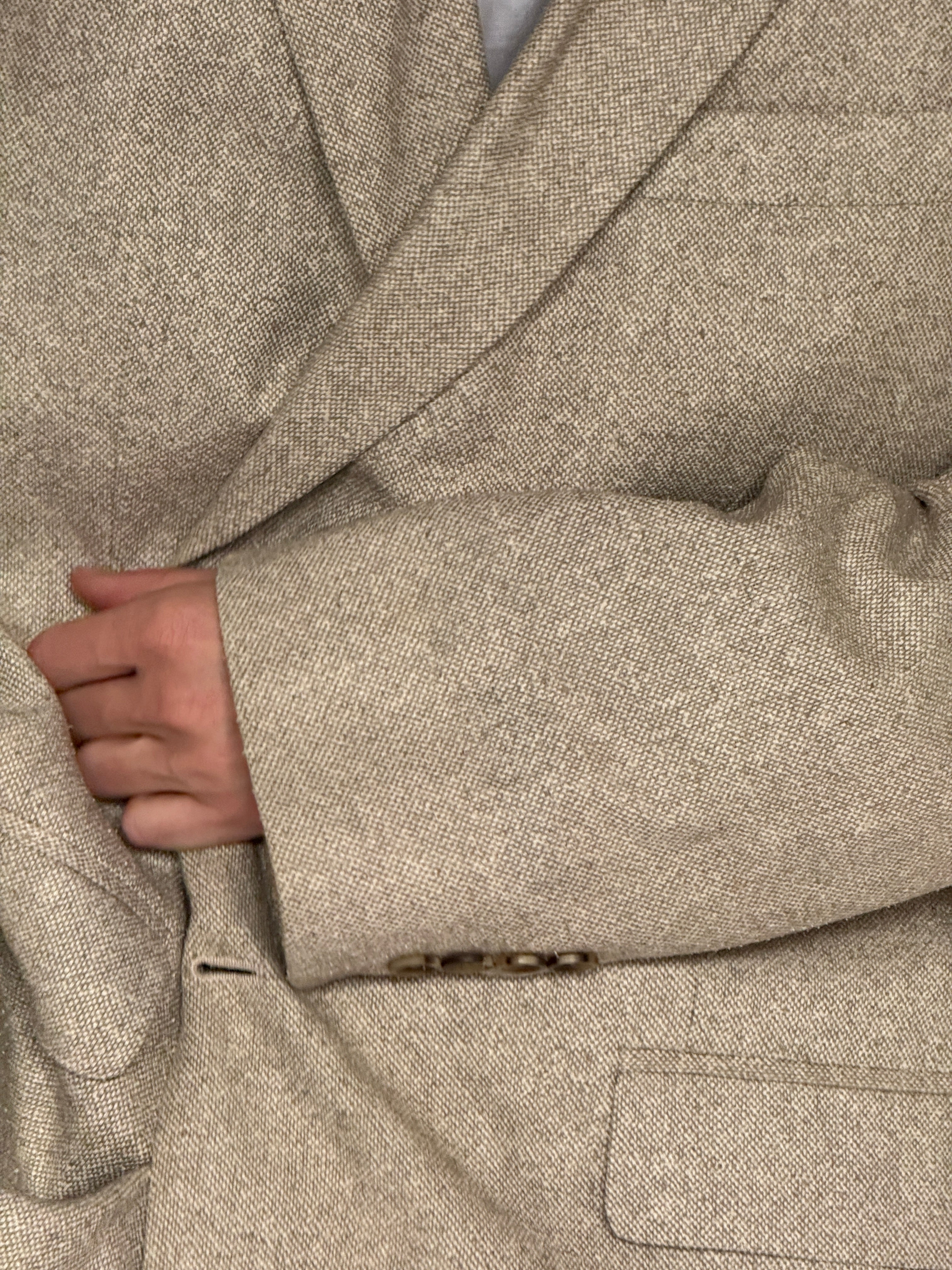 Vintage beige textured oversized blazer fabric close-up detail