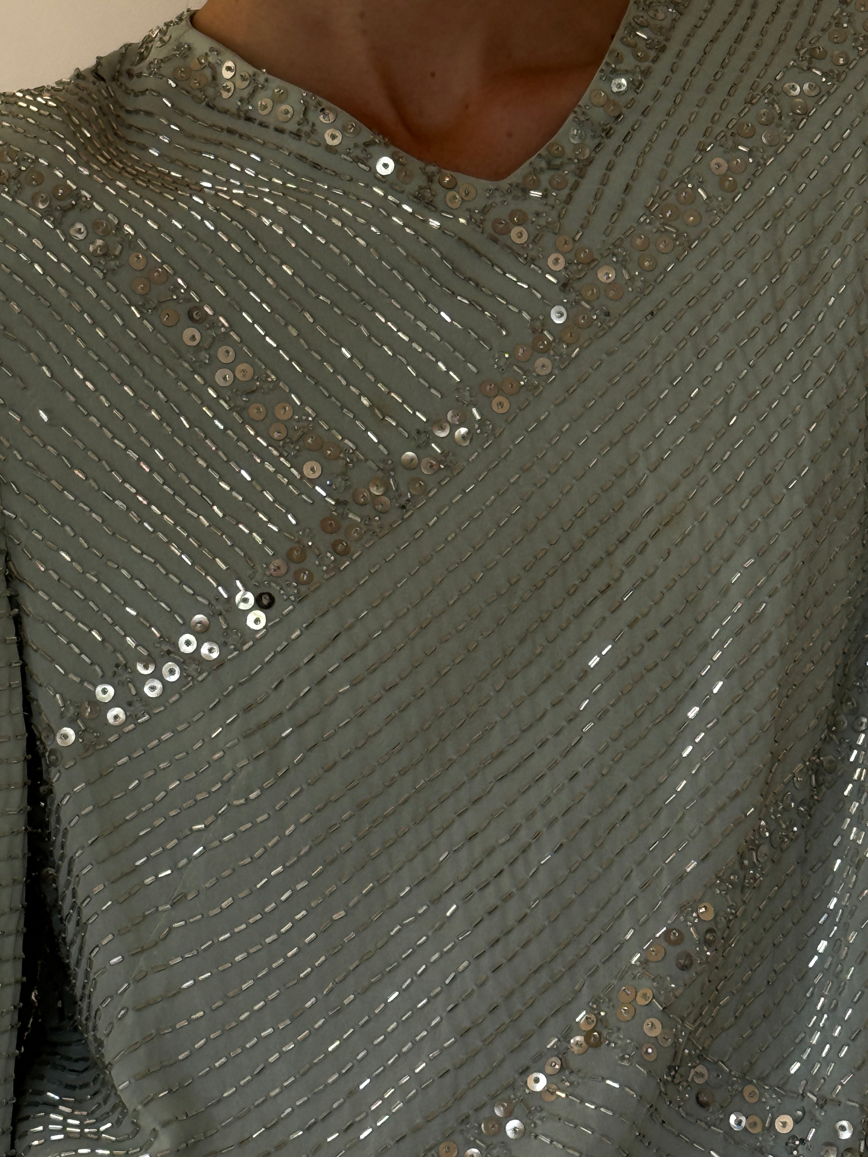 Vintage silver bugle bead and sequin fabric close-up