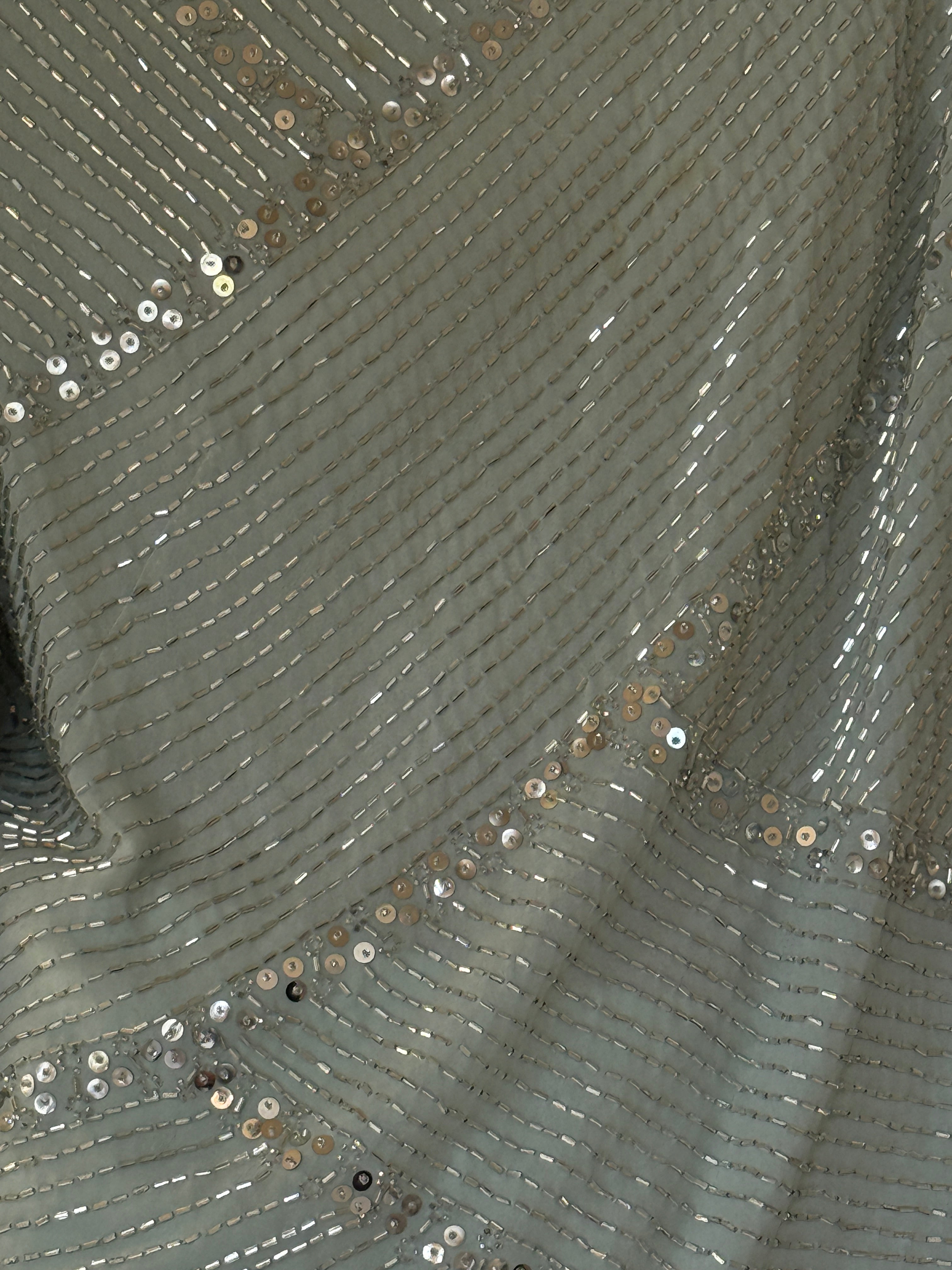 Vintage silver bugle bead and sequin fabric close-up