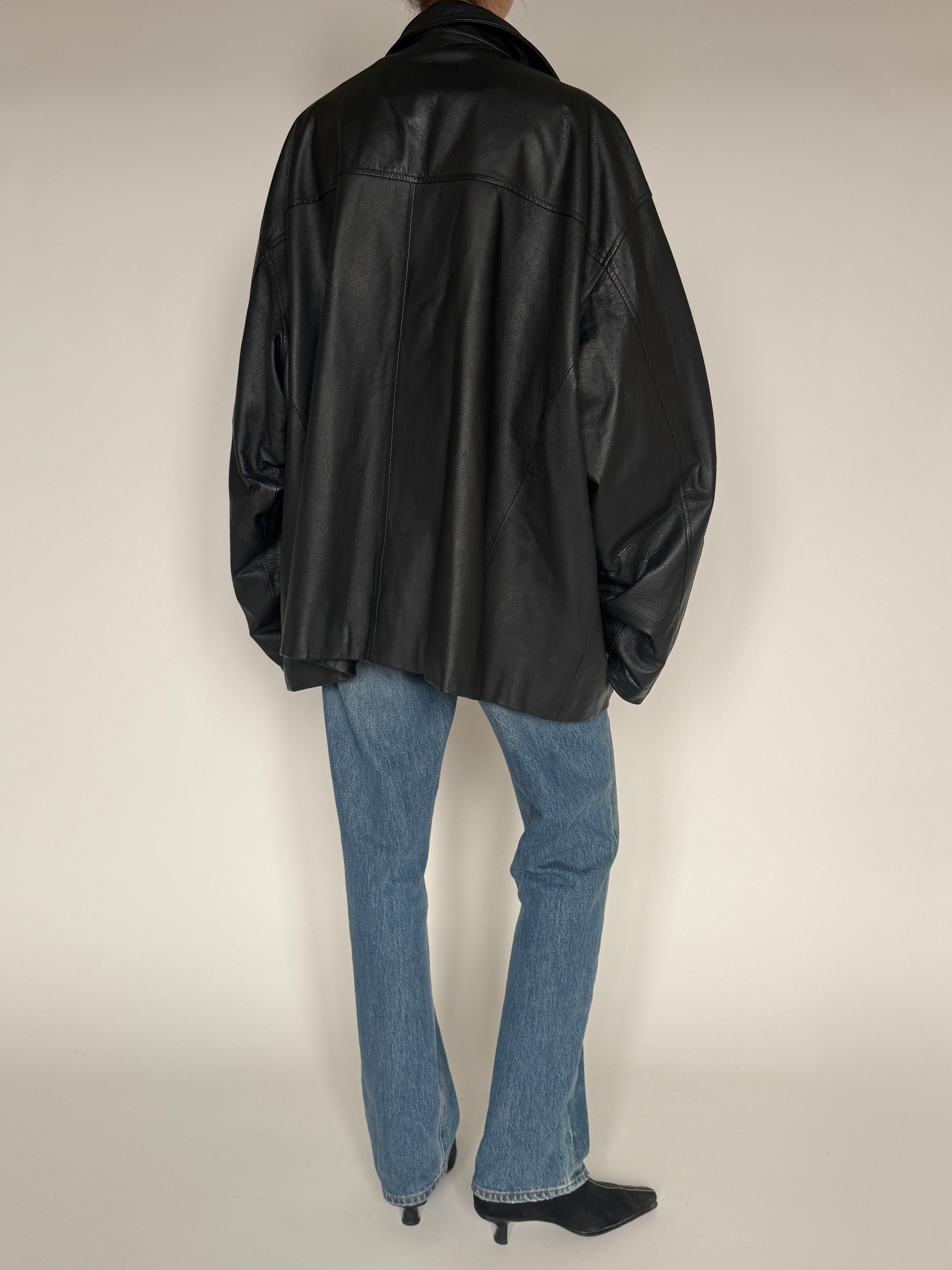 Vintage black oversized leather jacket back view