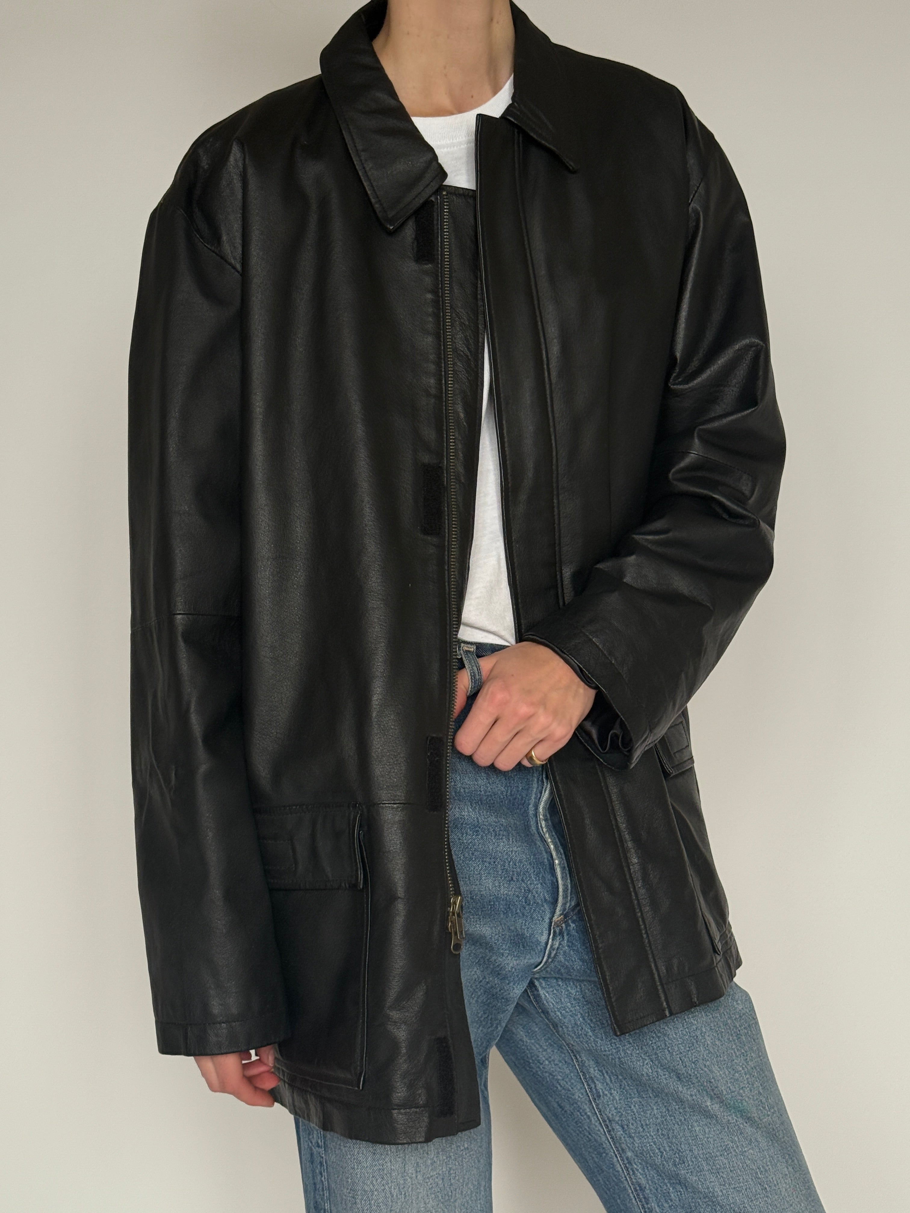 Vintage black leather jacket collar detail