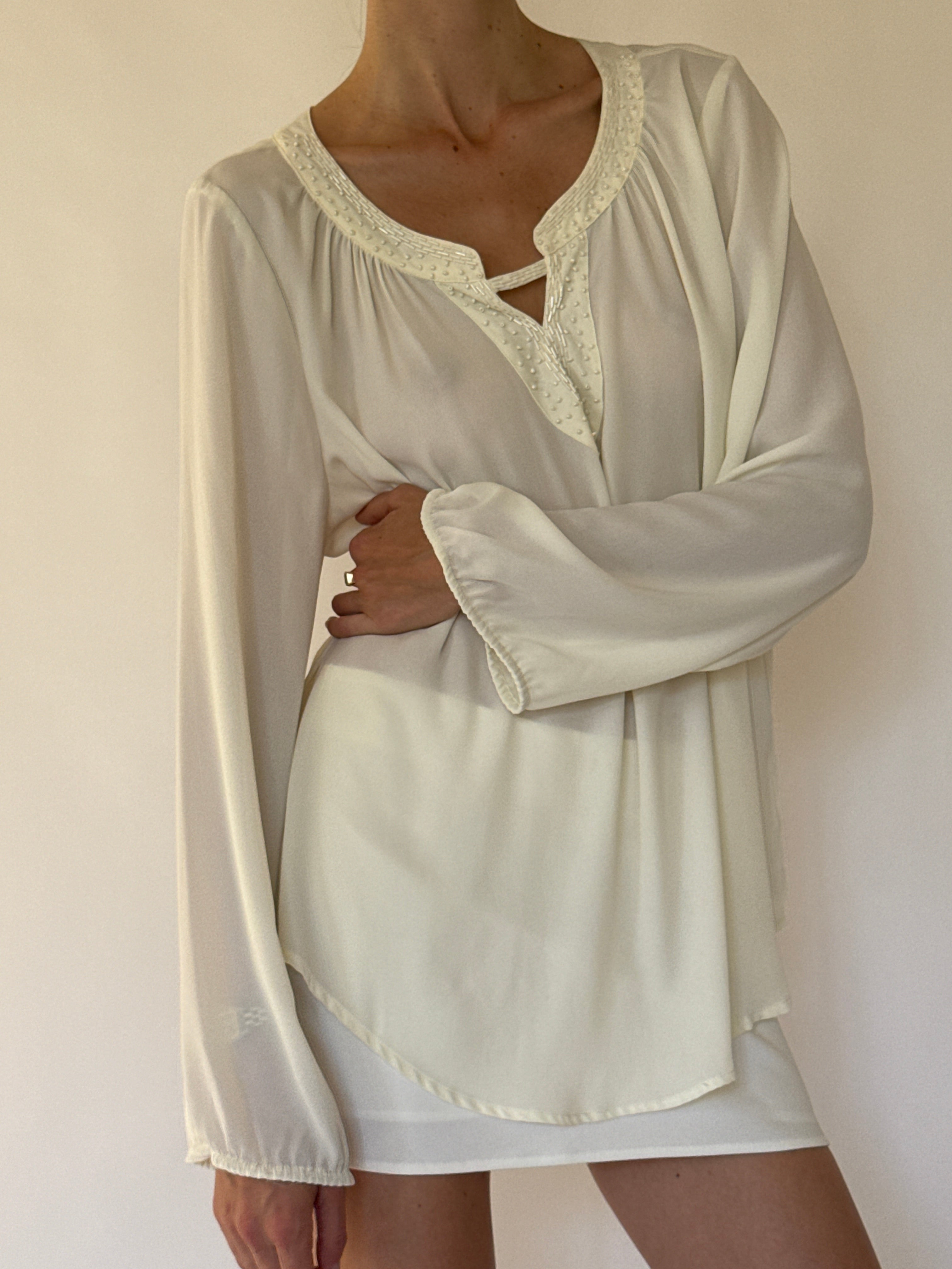 Vintage ivory beaded blouse three-quarter front view