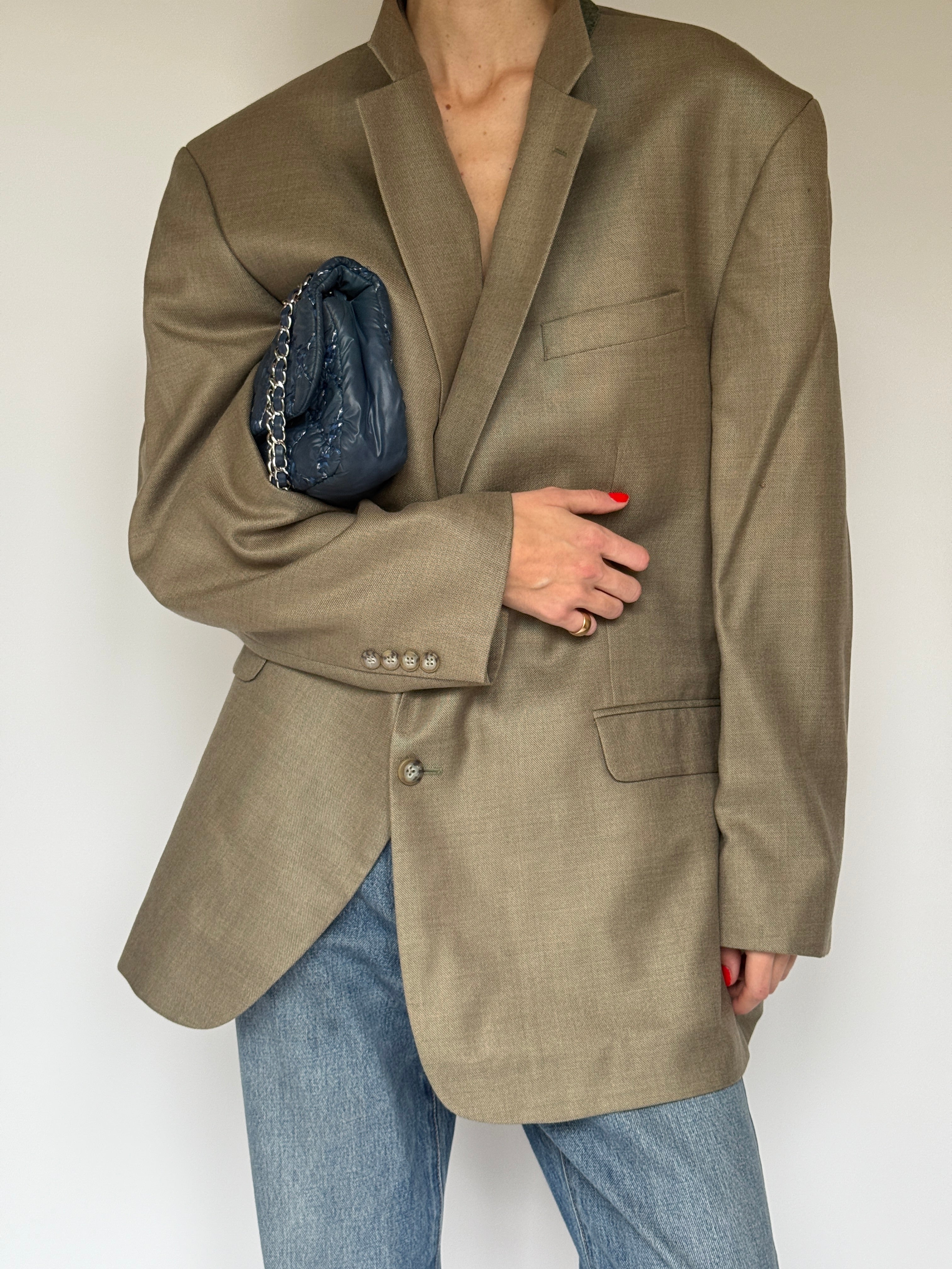 Vintage silk wool blend blazer featuring notched lapels in beige