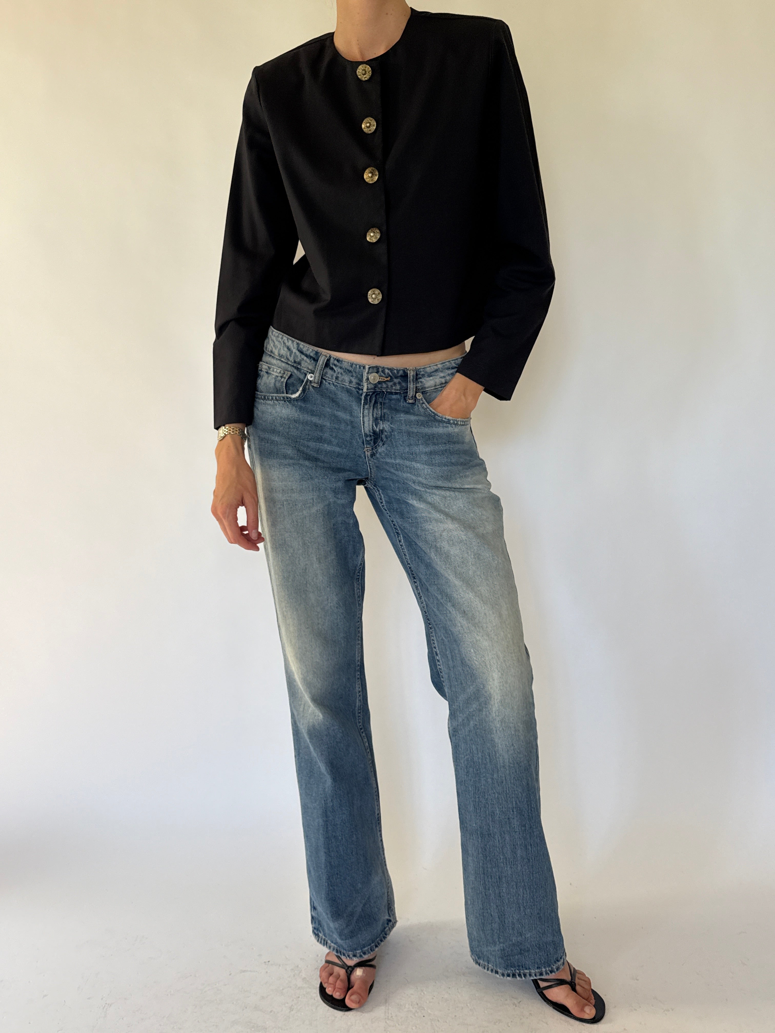 Vintage black cropped jacket angled view
