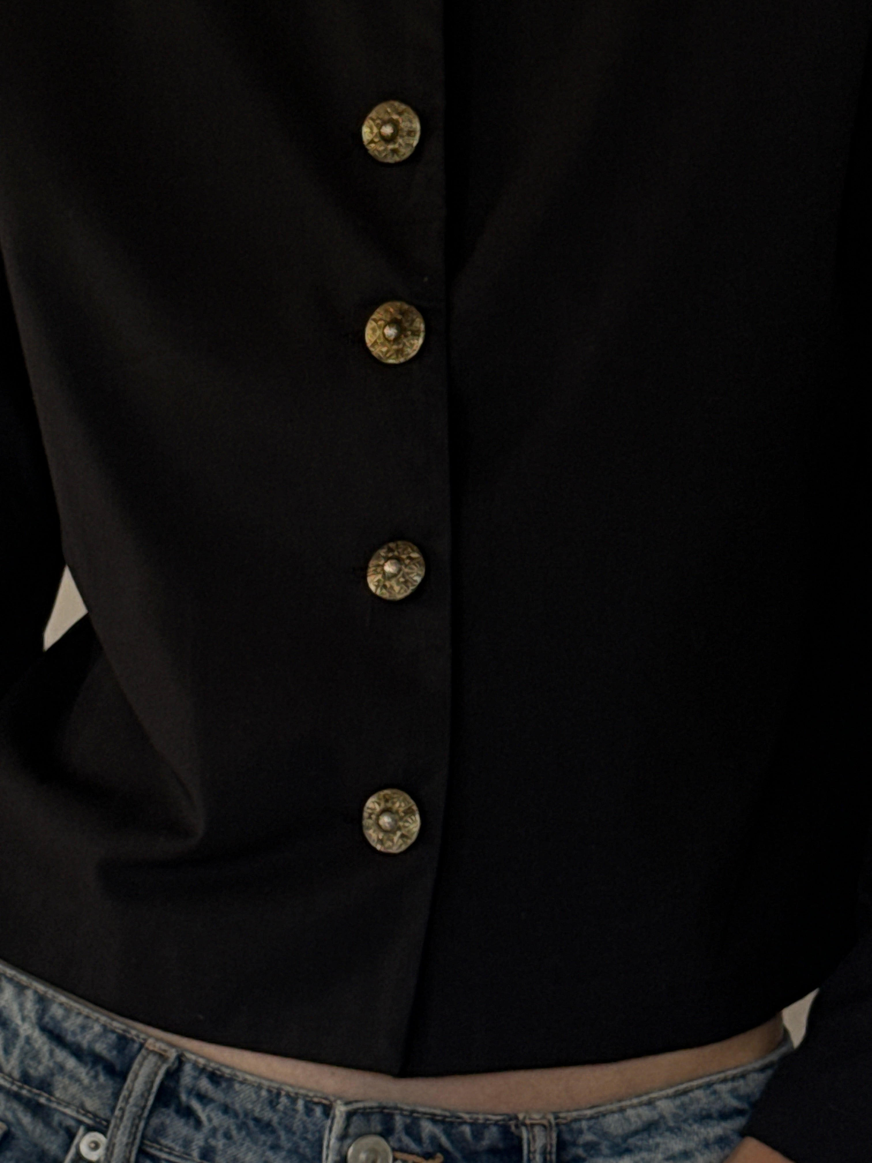 Vintage ornate gold-tone button detail