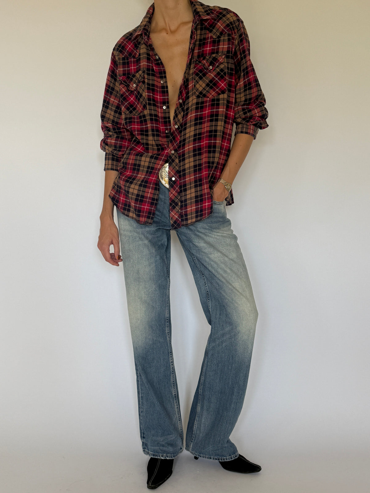 Vintage Western plaid flannel shirt fabric close-up